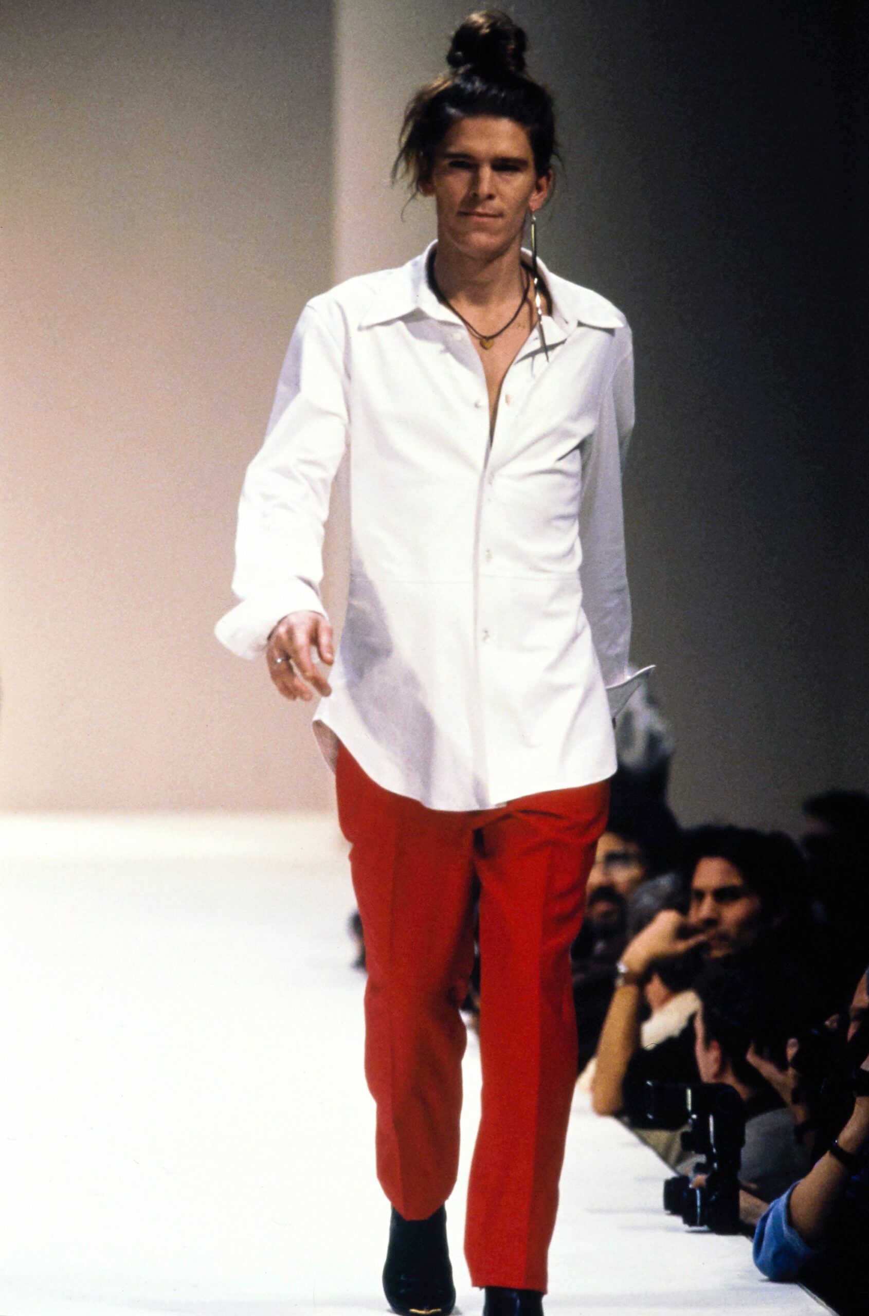 white relaxed shirt and red tailored pants
