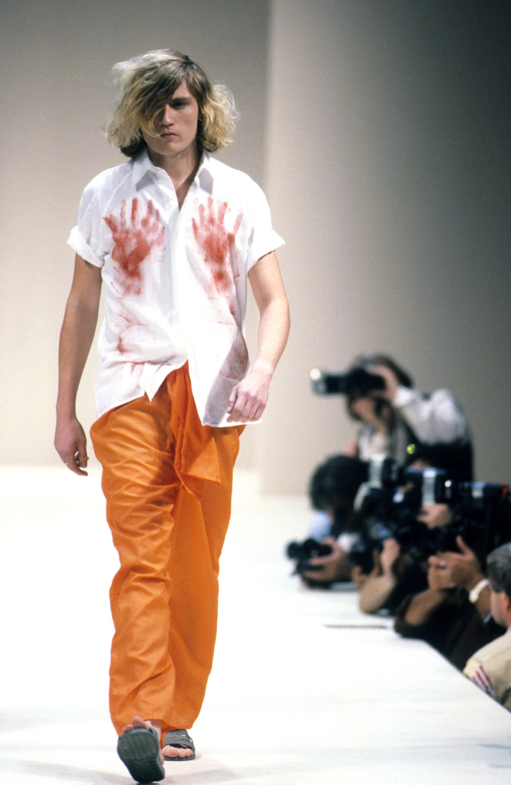 white shirt with orange pants