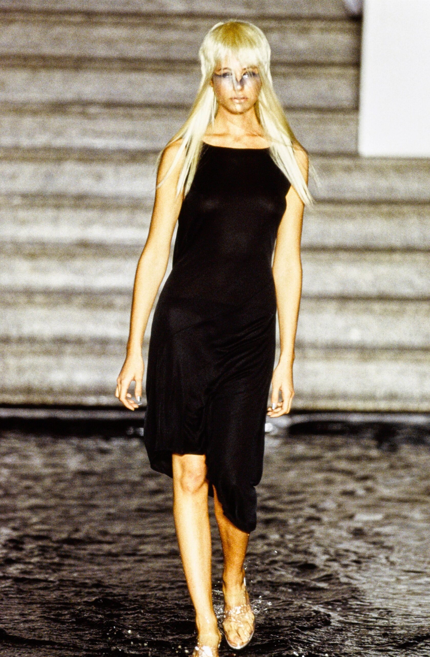 fitted black sleeveless dress