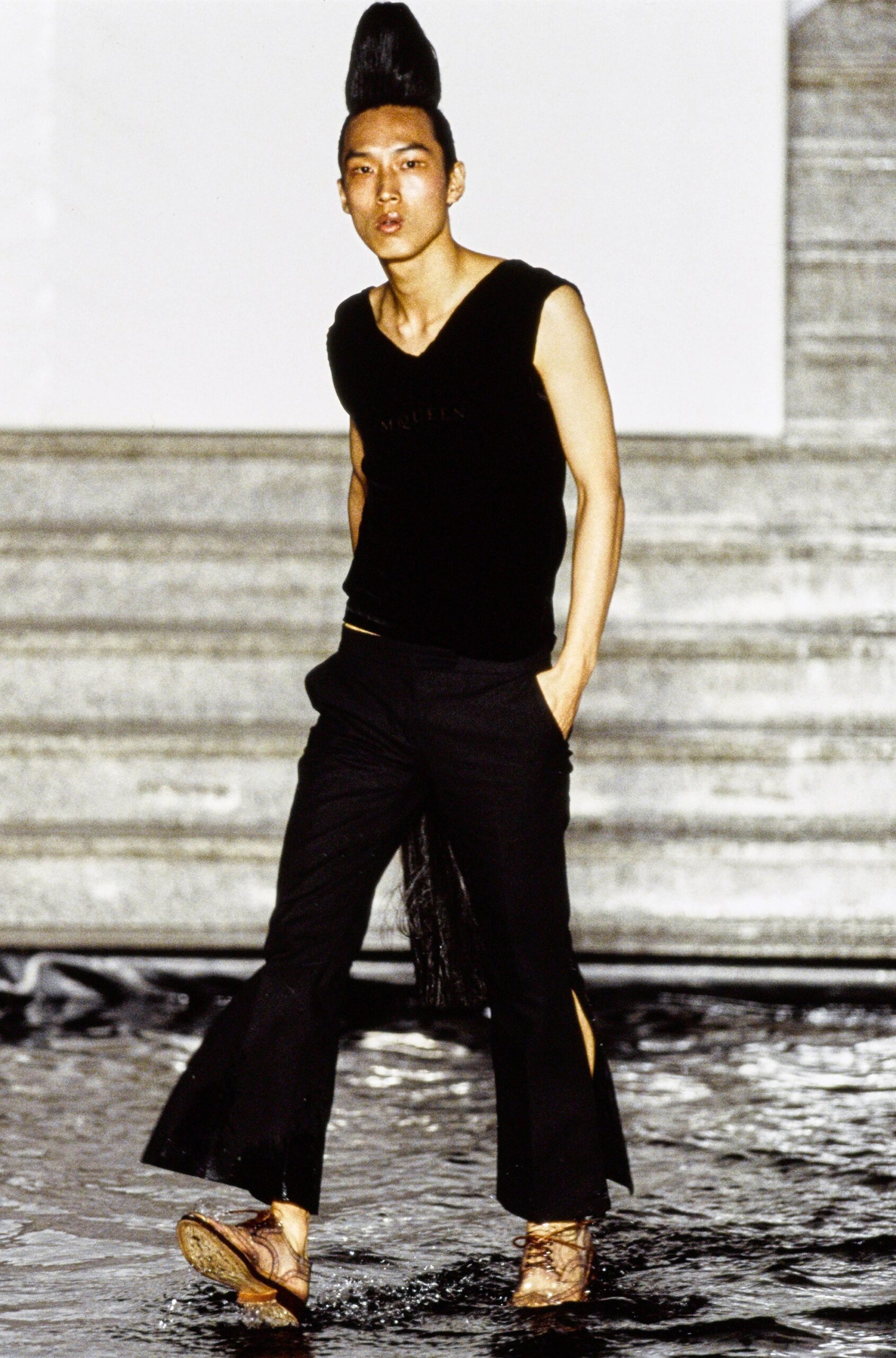 black fitted sleeveless top and pants
