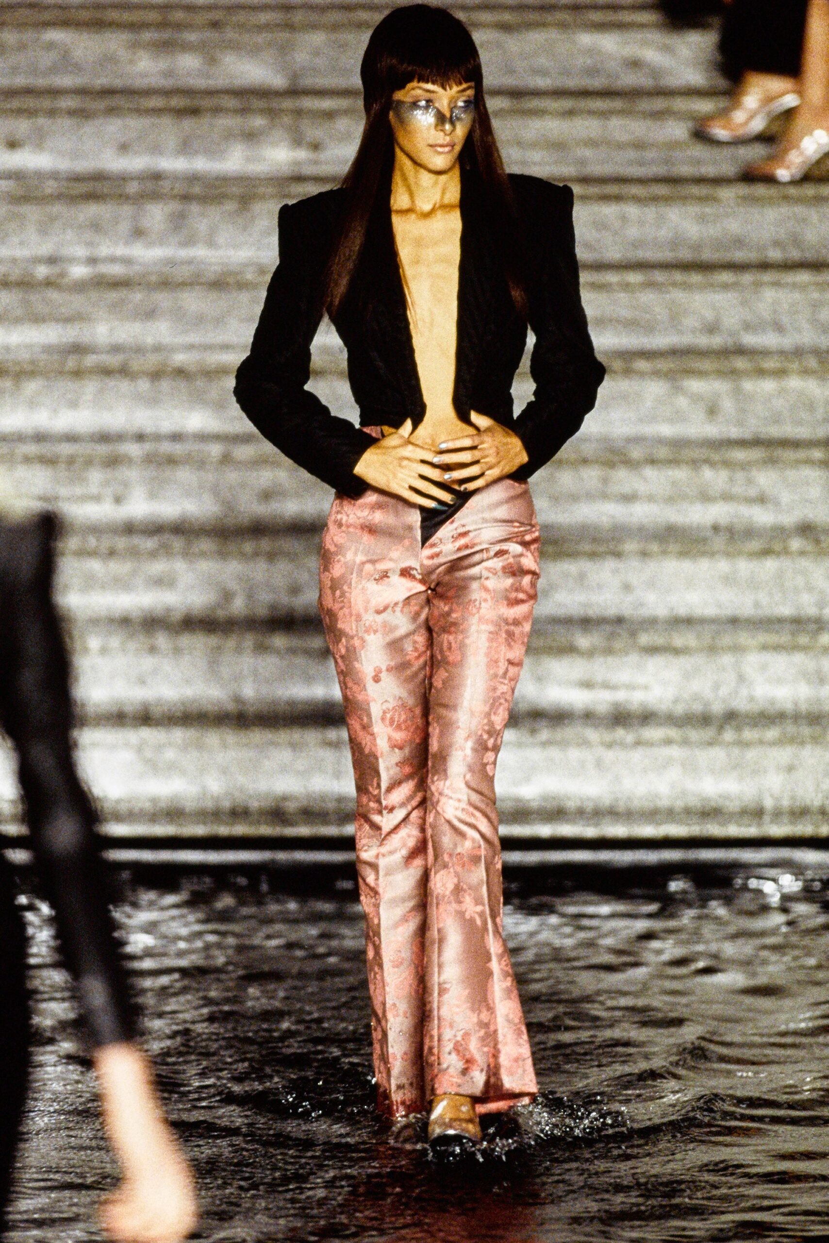 black fitted blazer with pink flared pants