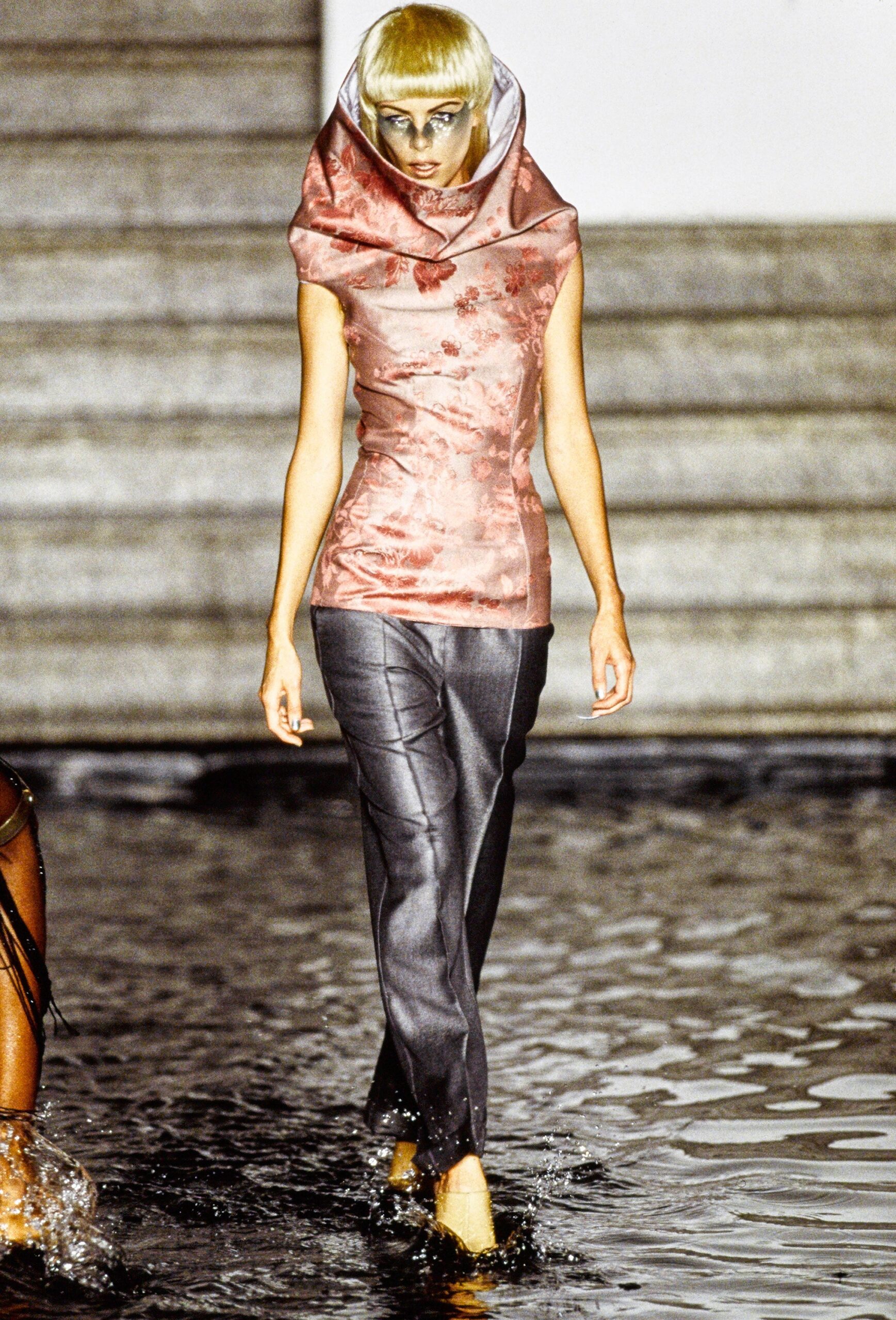 pink silk fitted top with gray pants