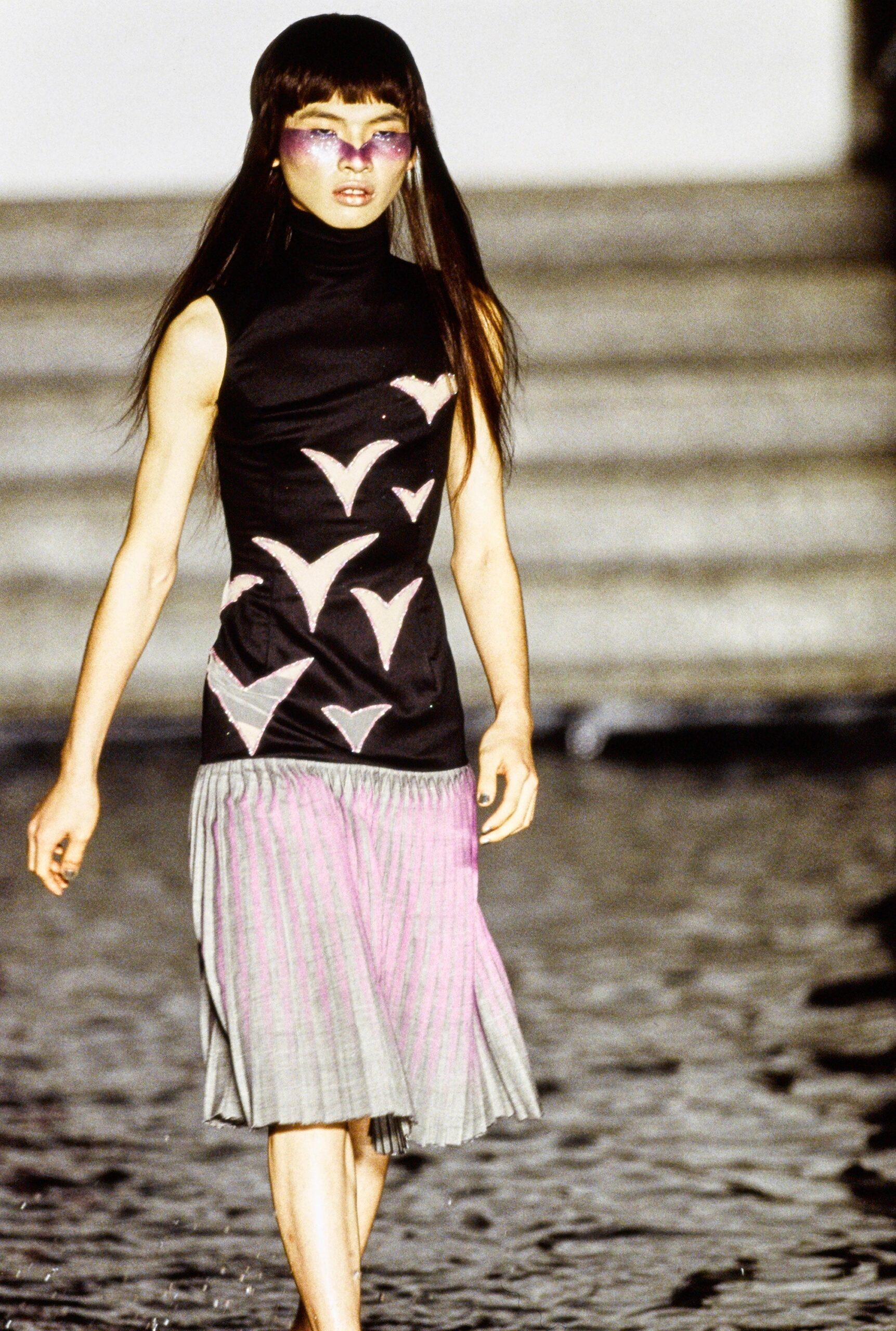 black fitted top with printed gray midi skirt