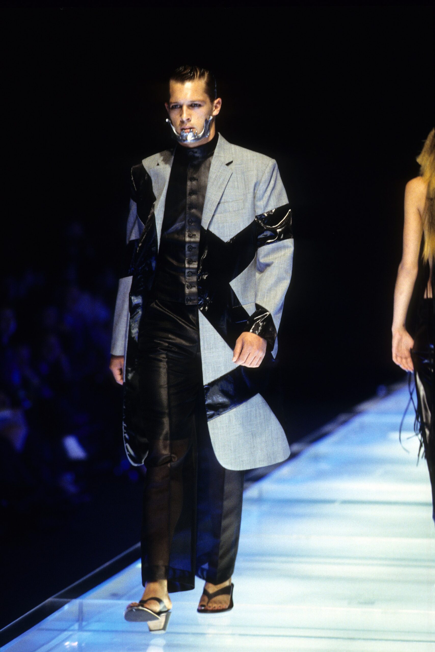 gray structured coat with black pants