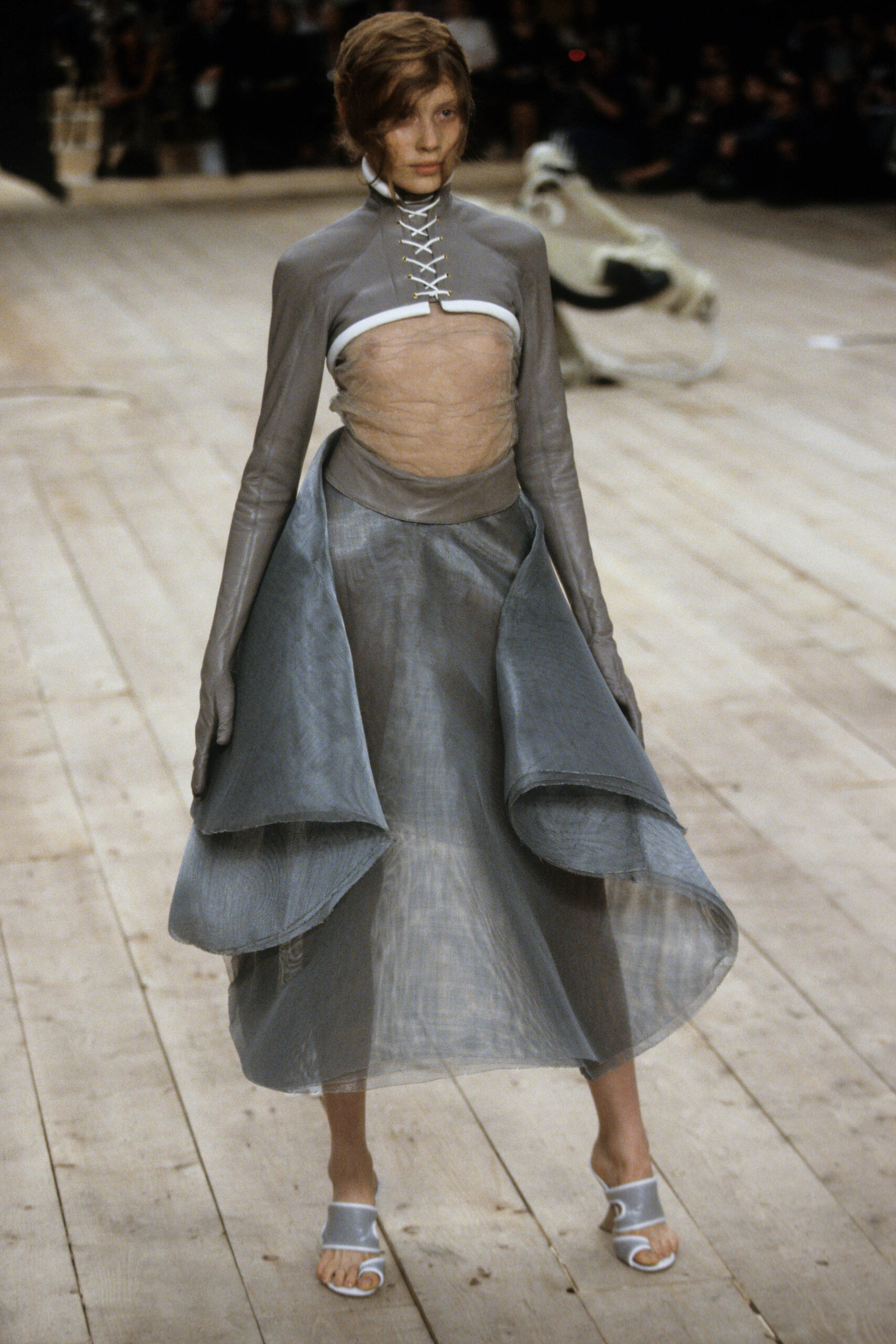 gray silk long-sleeve high-neck fitted draped flowing dress