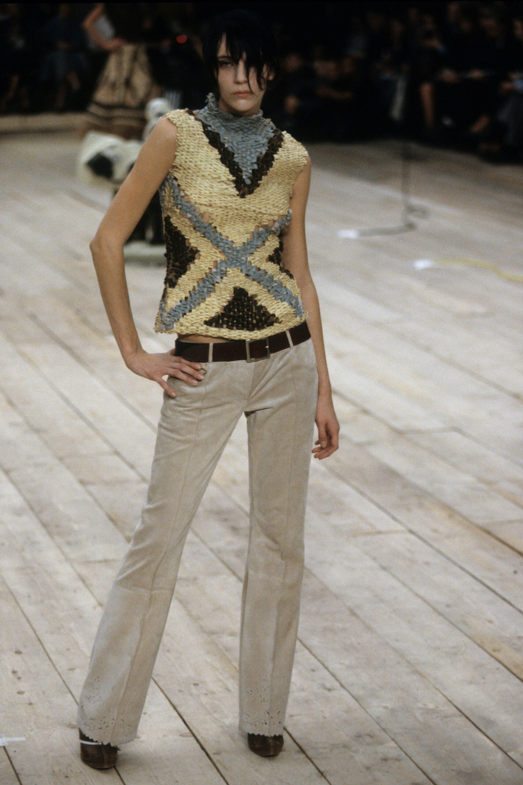 beaded sleeveless top with flared pants