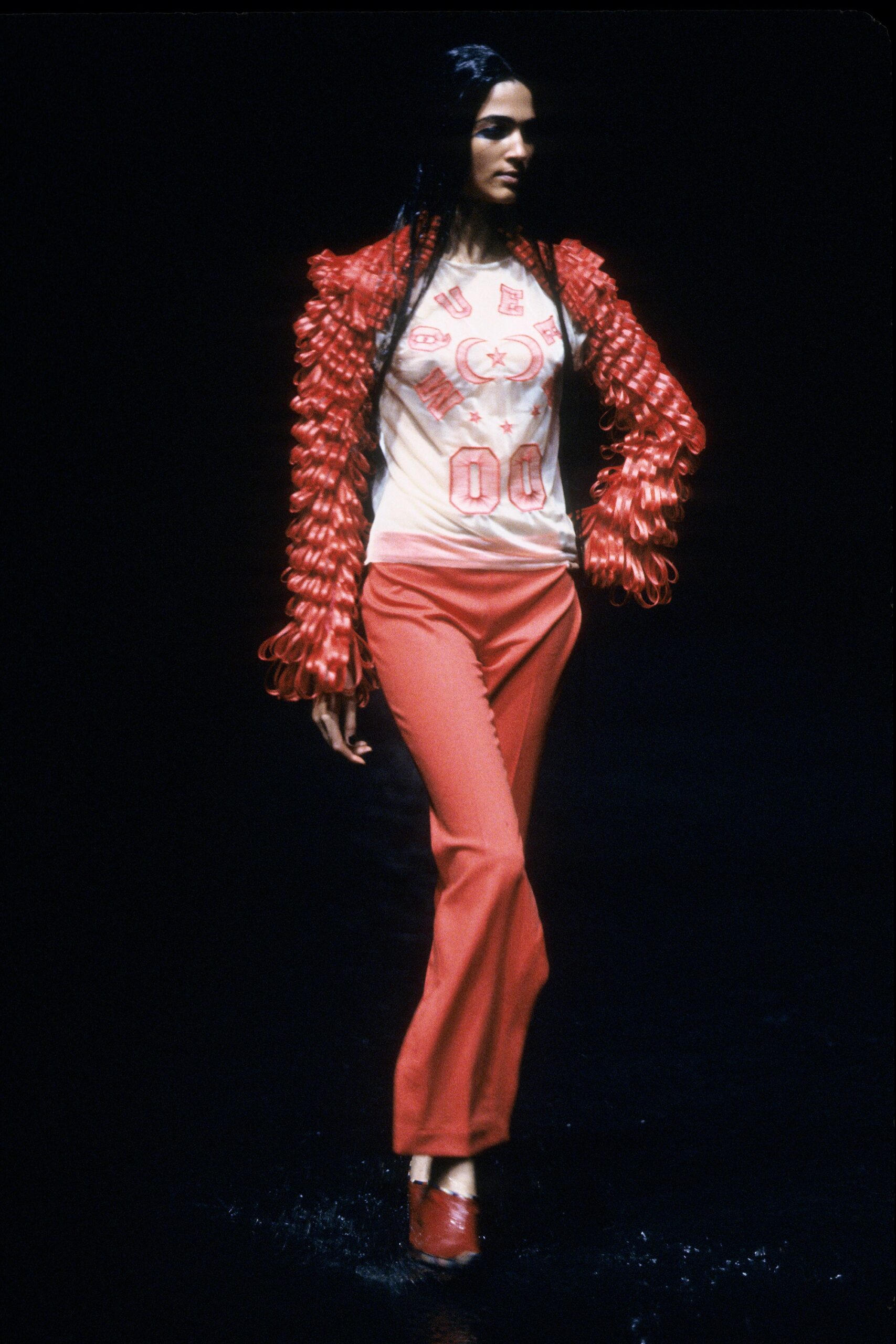 red fitted top with ruffles