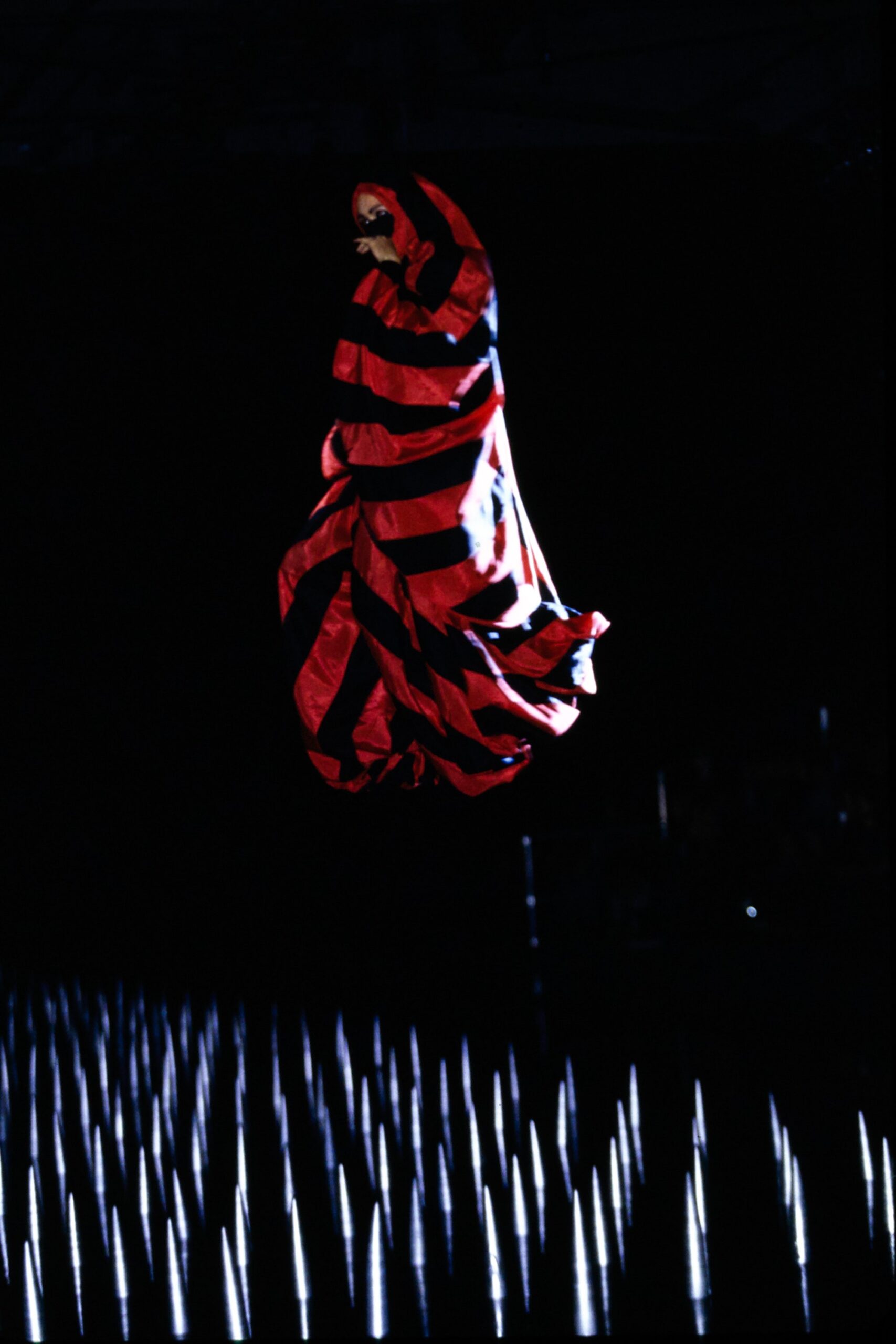 red and black striped cape