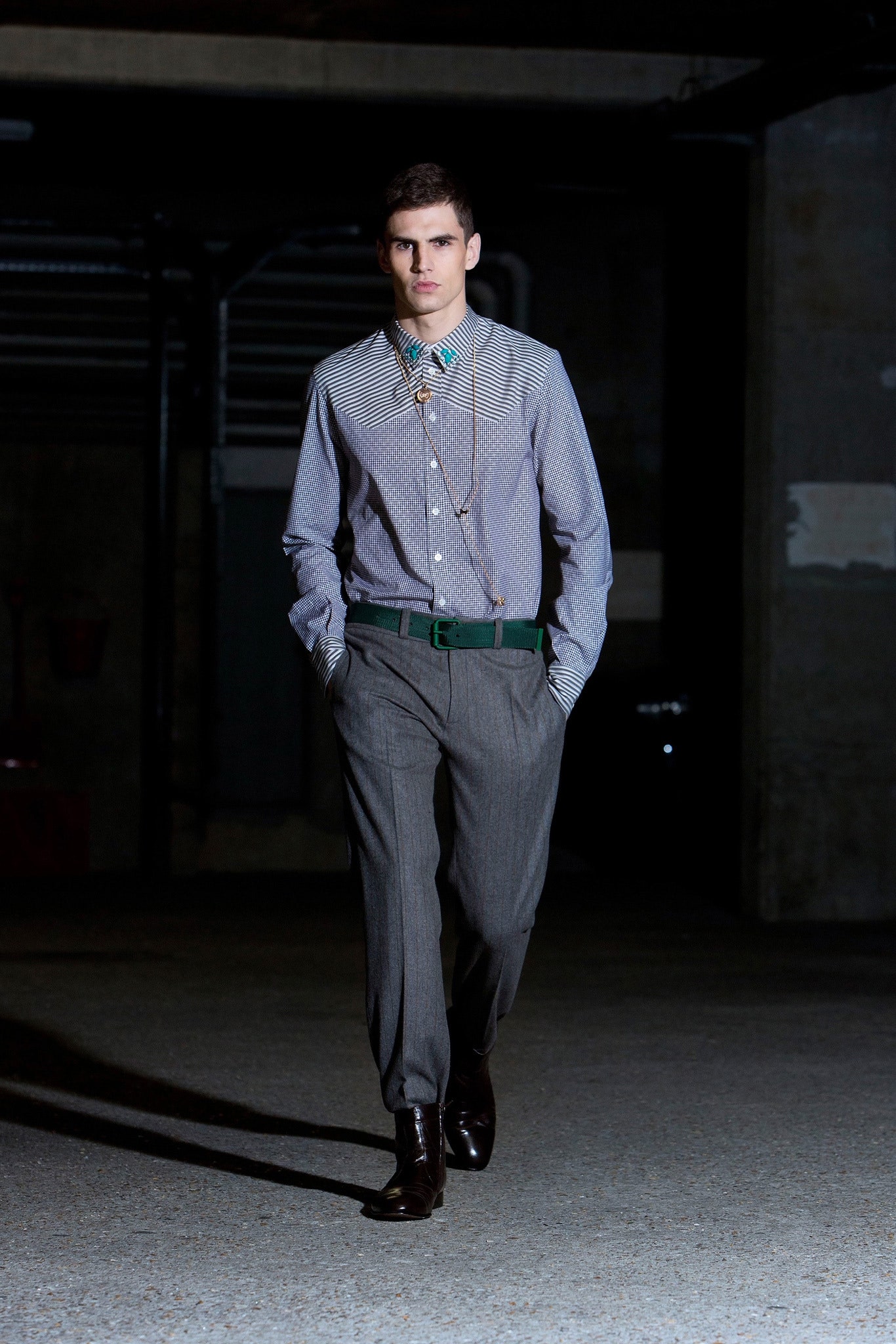 fitted blue and white checked shirt with tailored gray pants