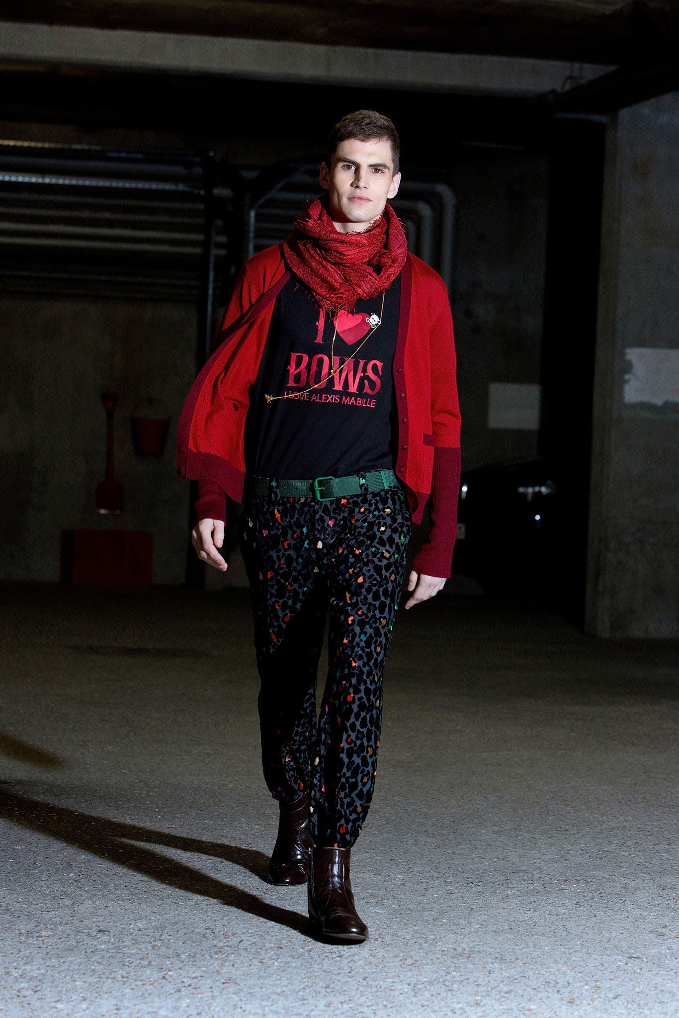 black sweater red cardigan multi pants