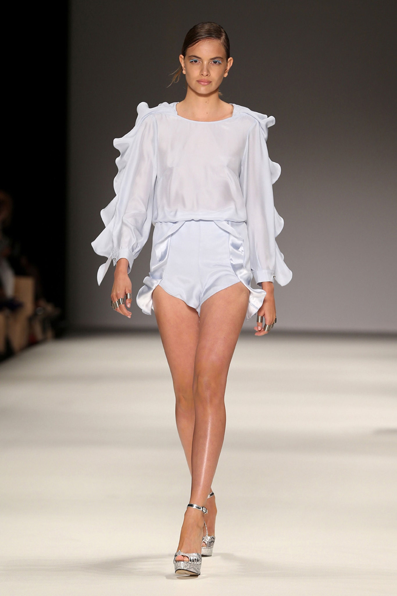 white silk long-sleeve collared fitted ruffled top