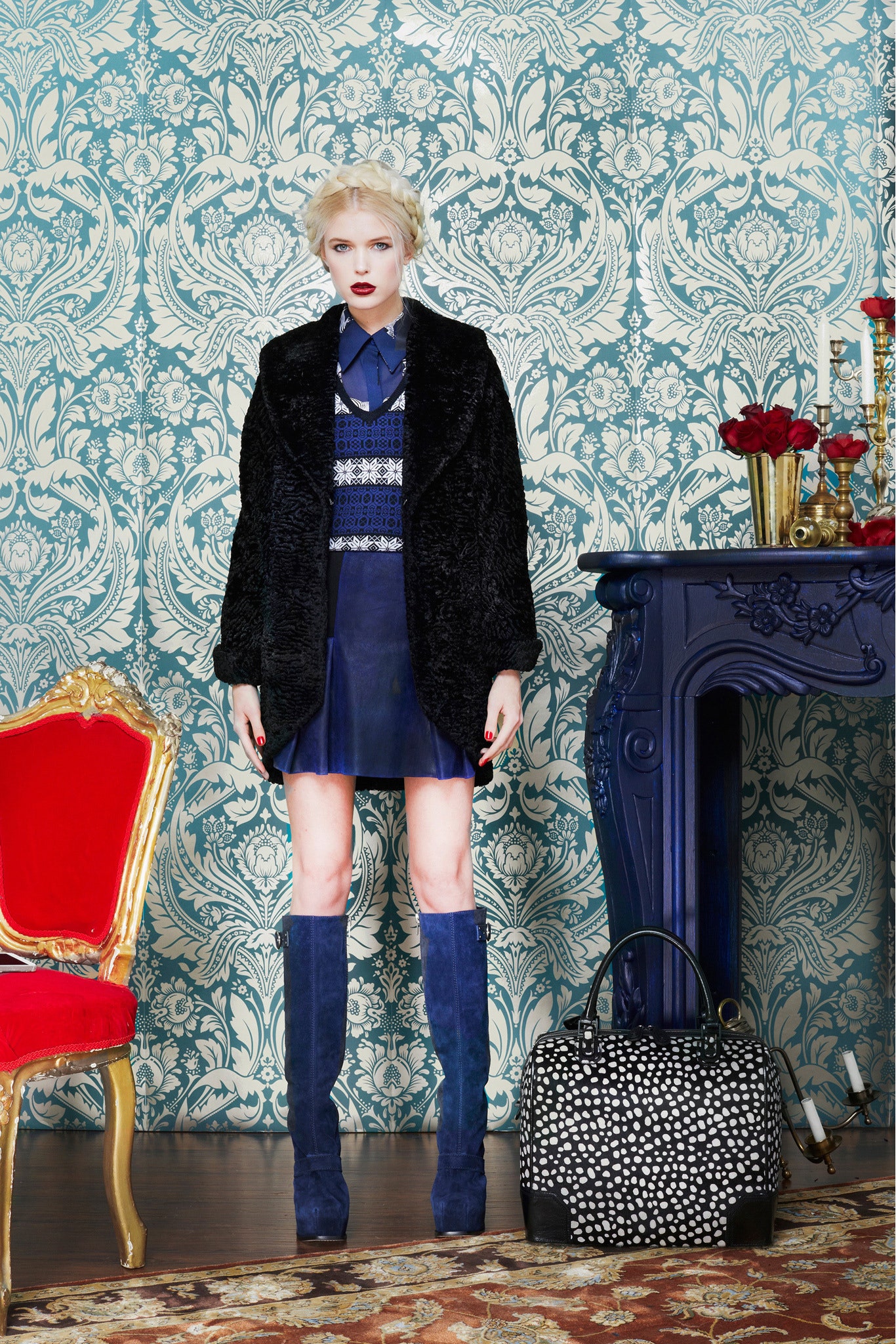 black faux-fur coat and blue dress