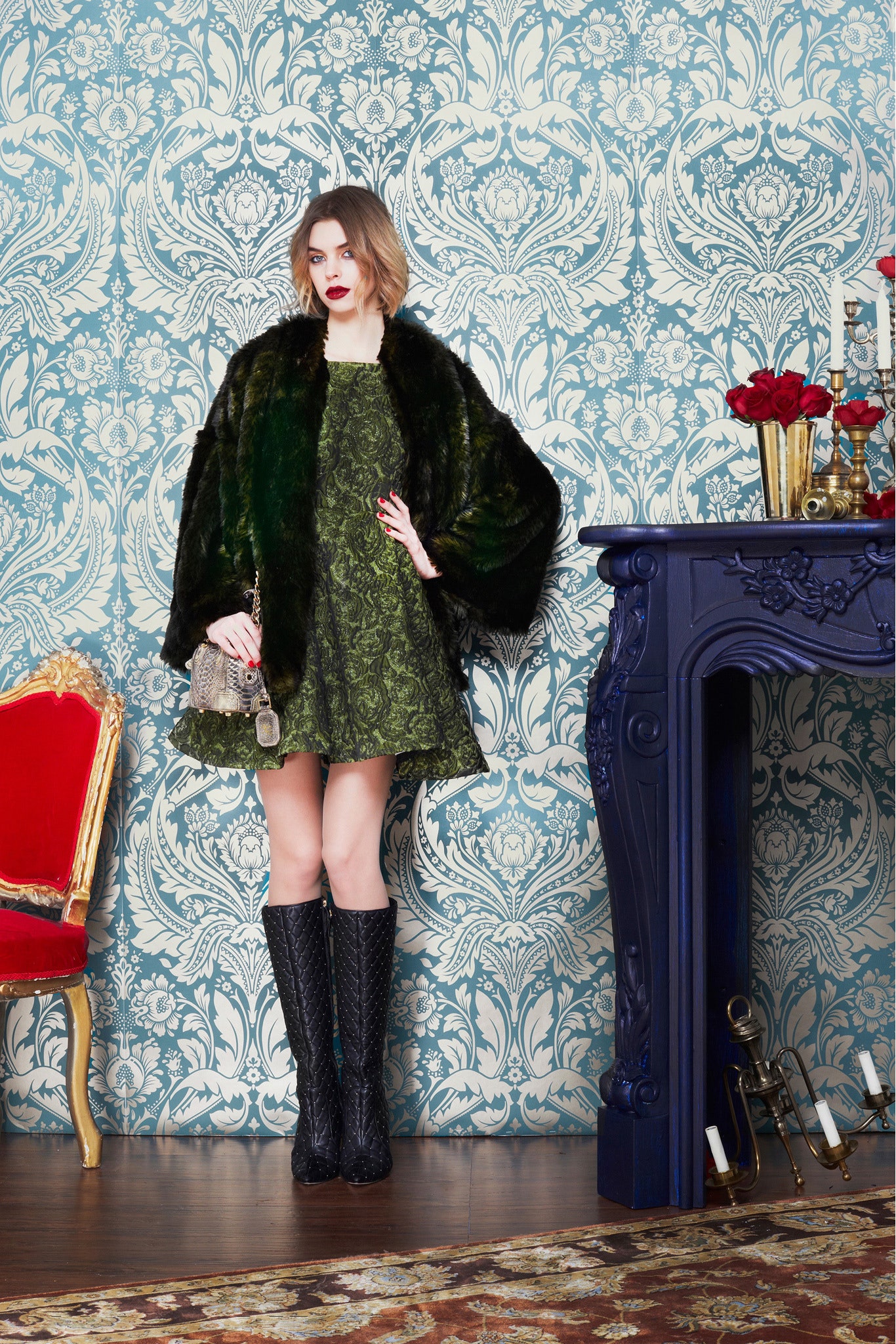 green silk mini dress with black cape