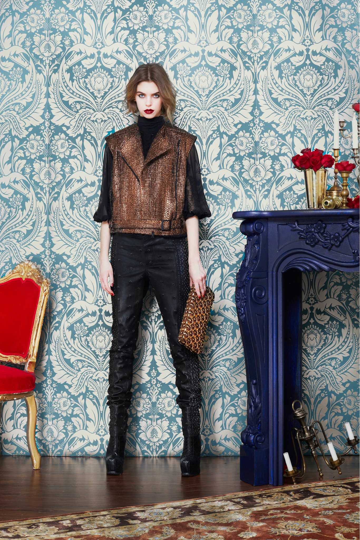 fitted brown and black top with leather pants