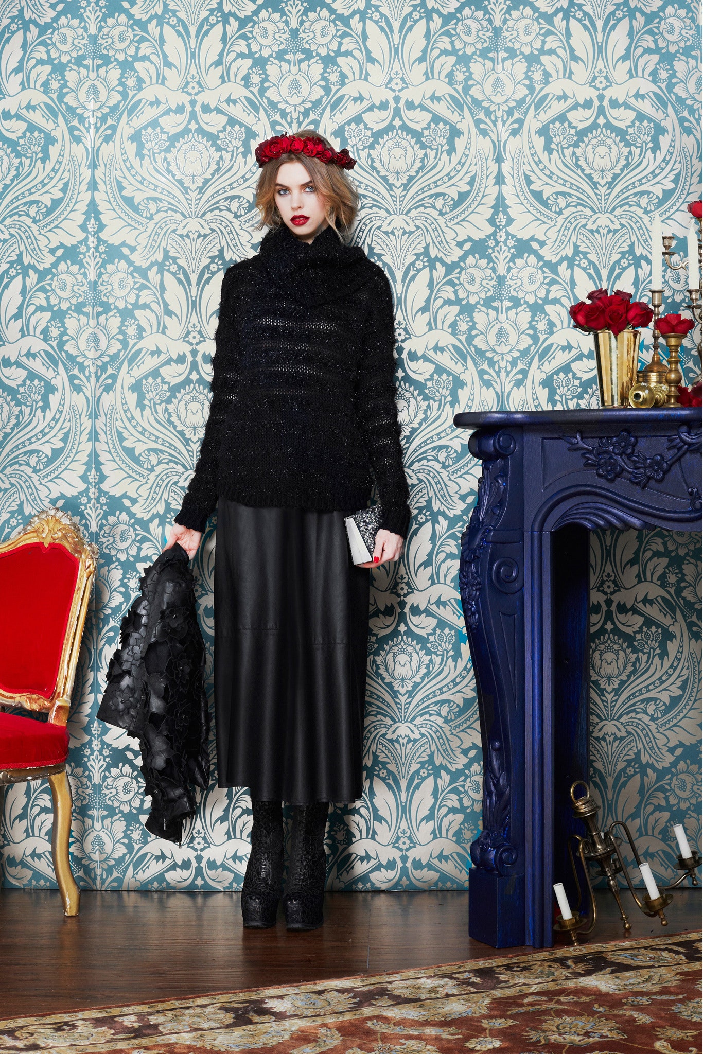 black wool sweater and leather skirt