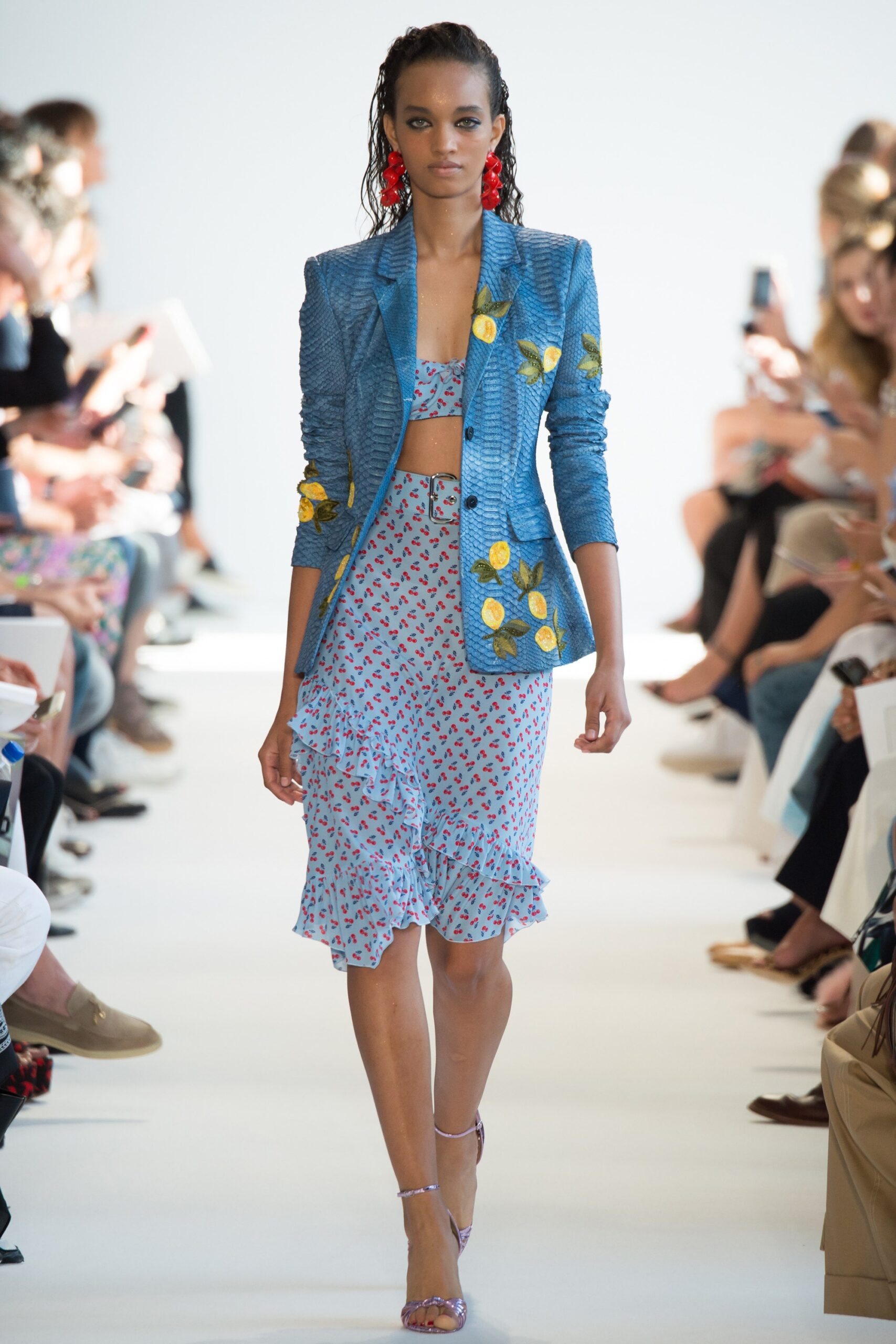 blue tailored blazer with crop-top and ruffled skirt