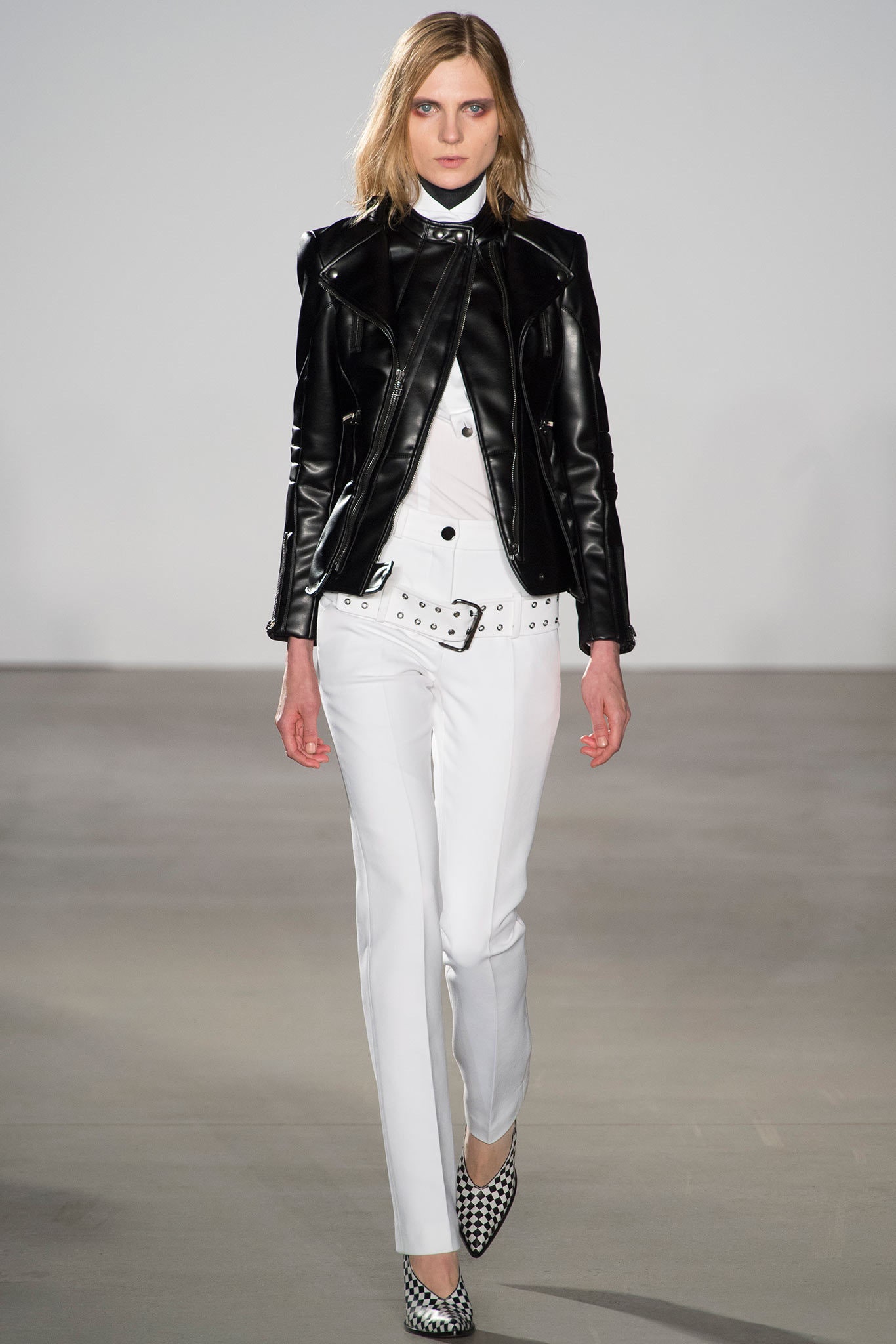 black leather fitted jacket with white shirt and tailored pants