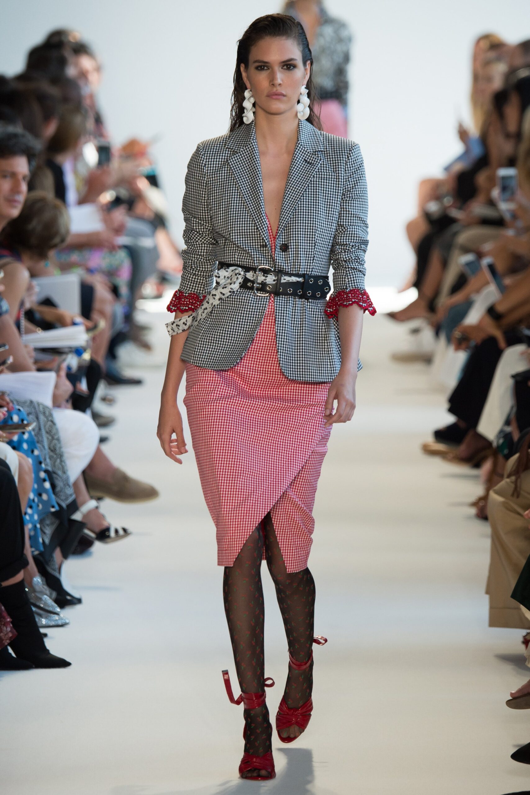 tailored black and white blazer with red dress