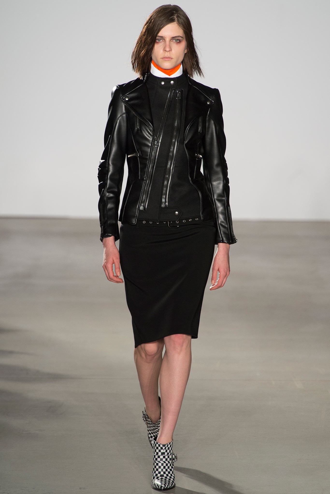 fitted black leather jacket and pencil skirt