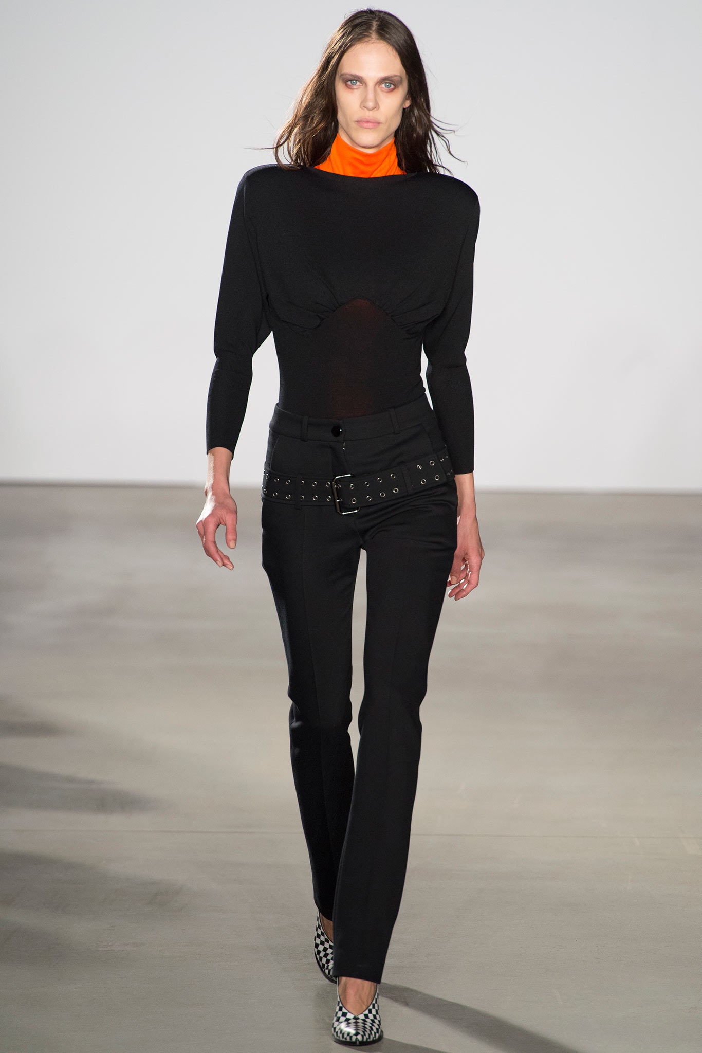 black fitted top with orange accent