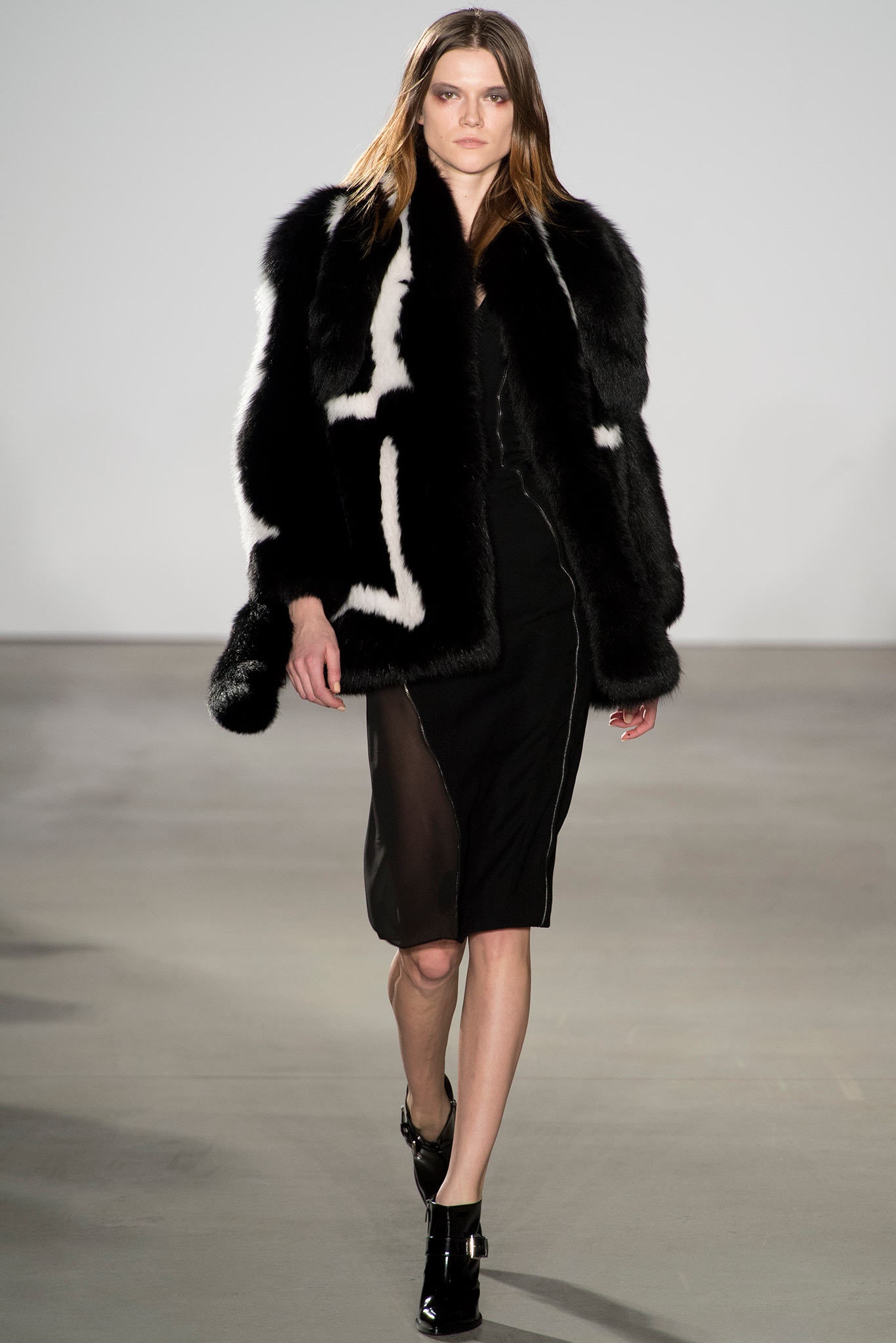 black and white fur coat with black dress