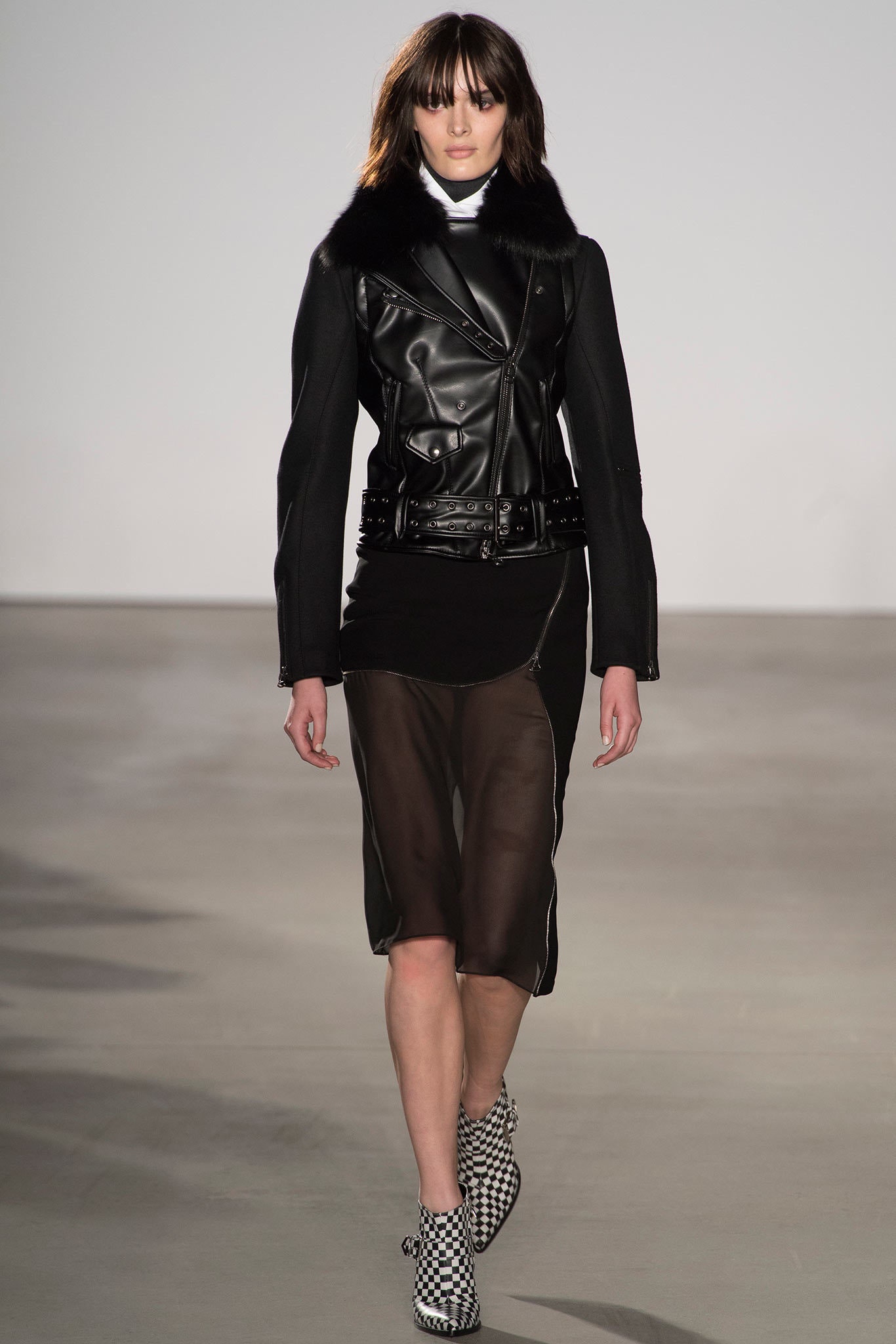 black leather fitted jacket and sheer midi skirt