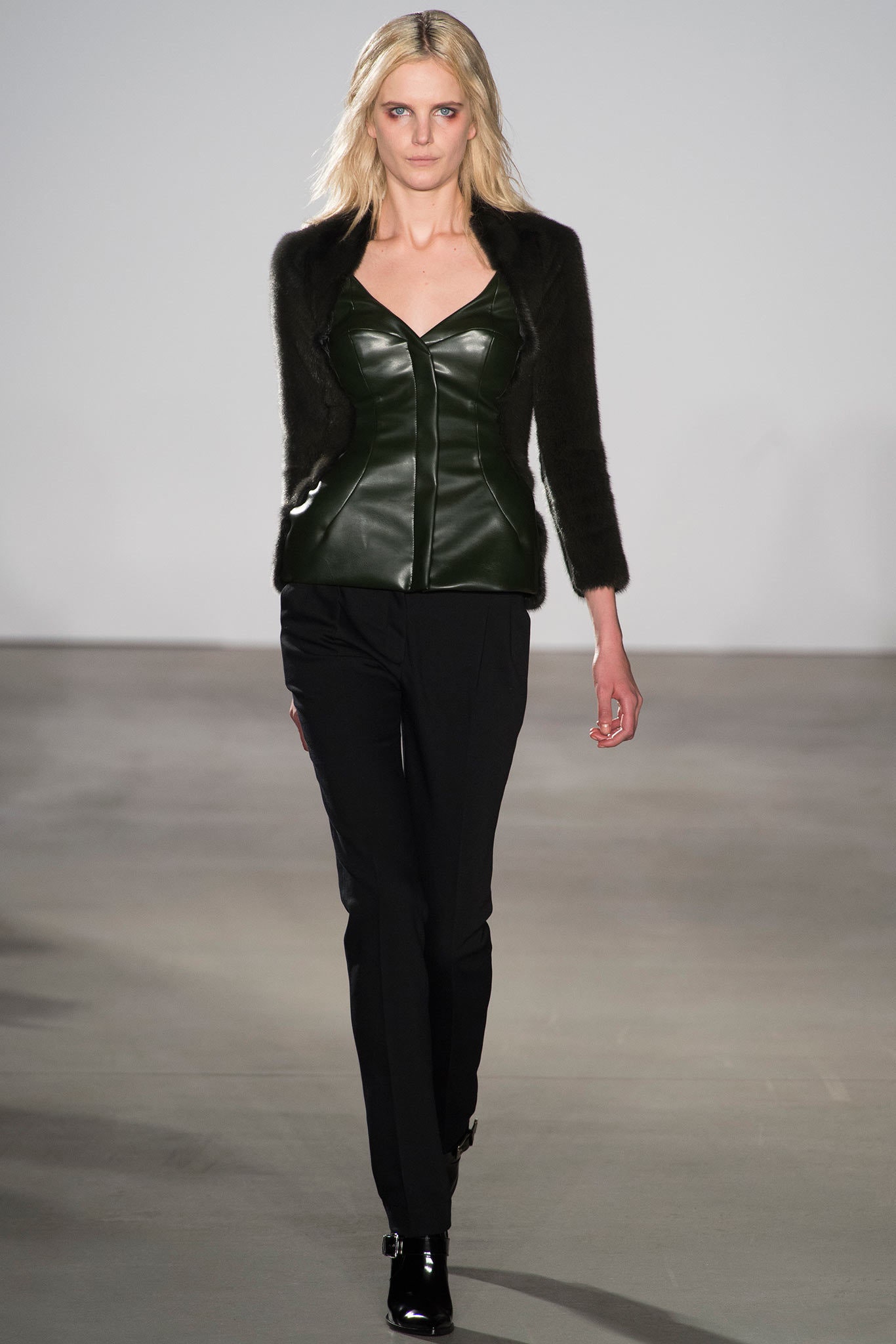 green leather long-sleeve v-neck fitted zippered top