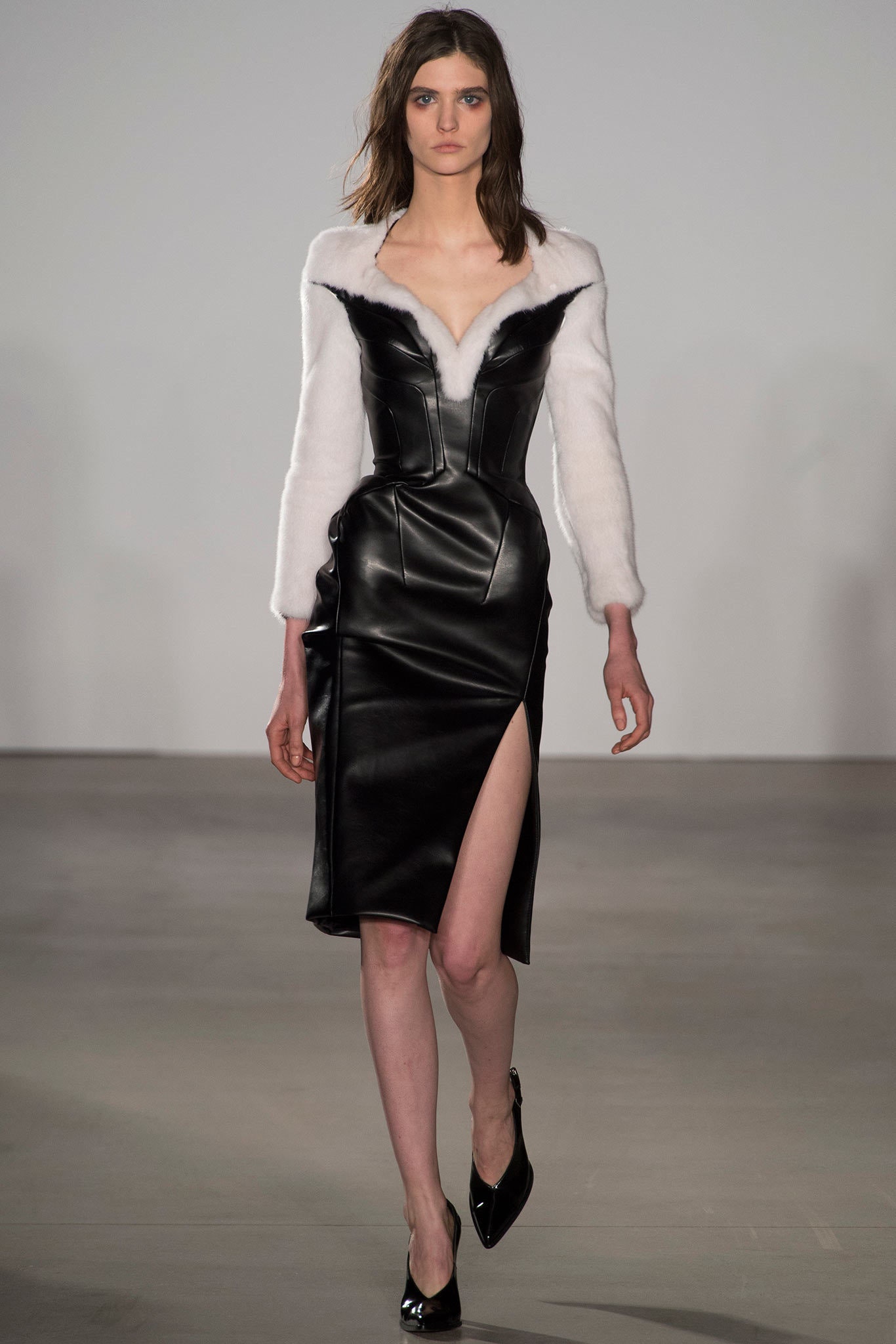 black leather midi dress with white fur jacket