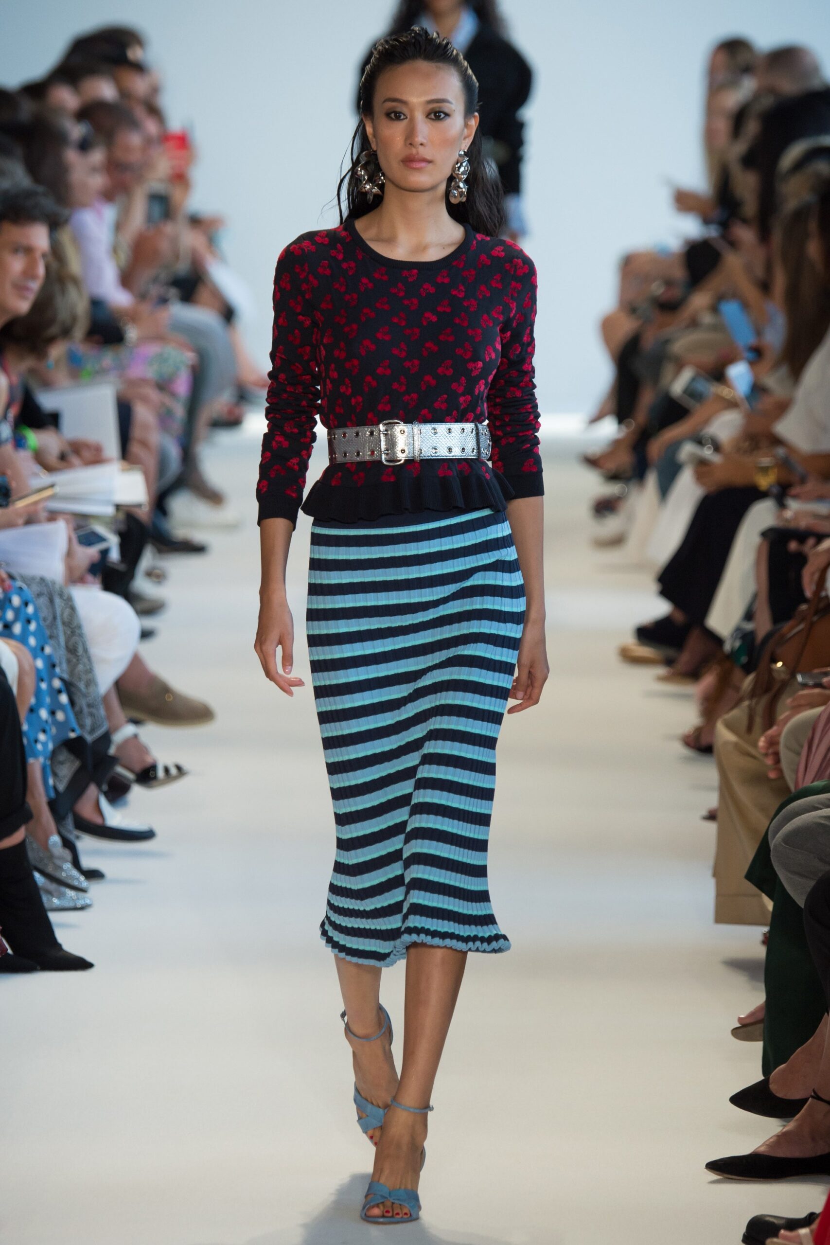 red printed long-sleeve top with striped midi skirt