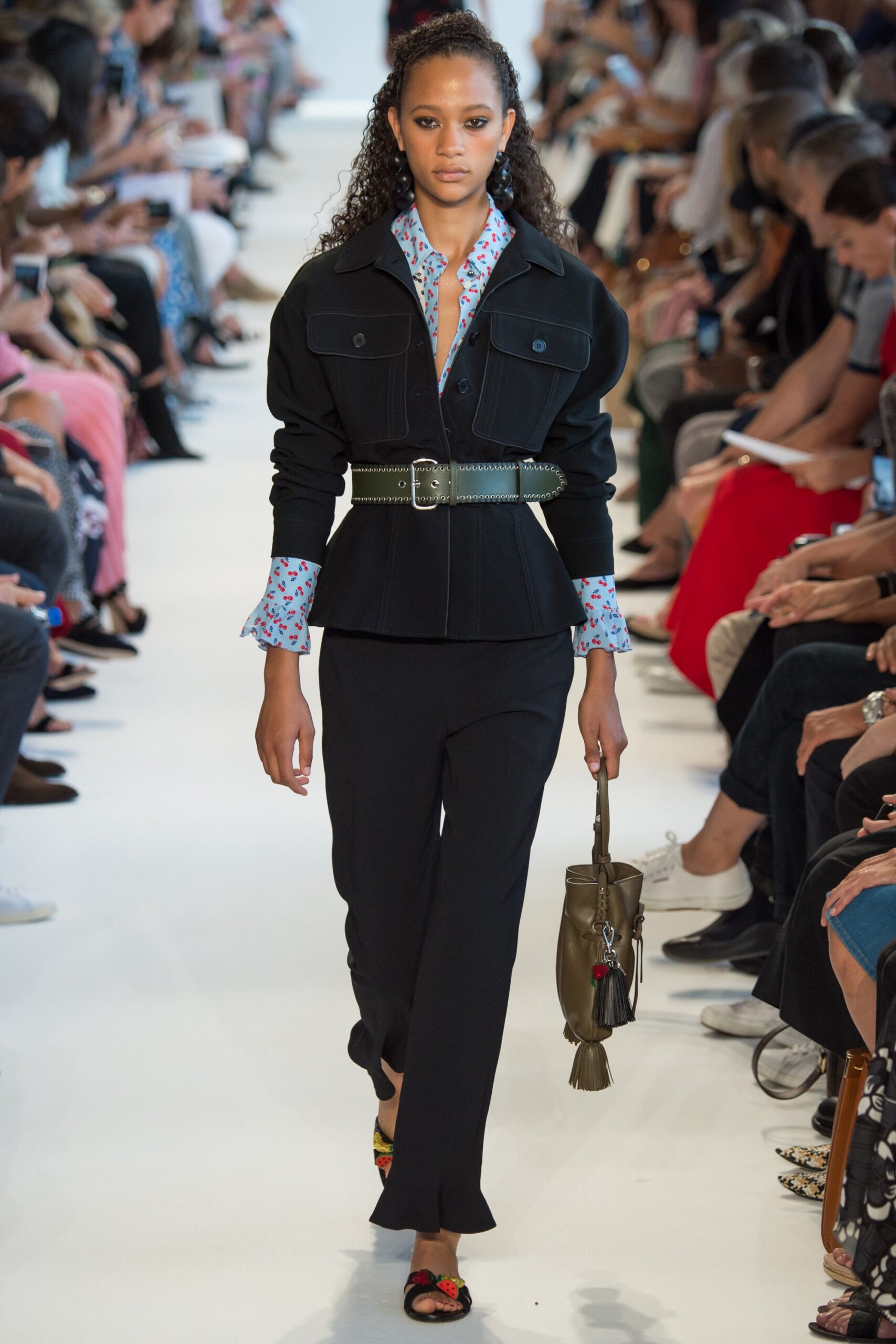 black fitted jacket with floral shirt