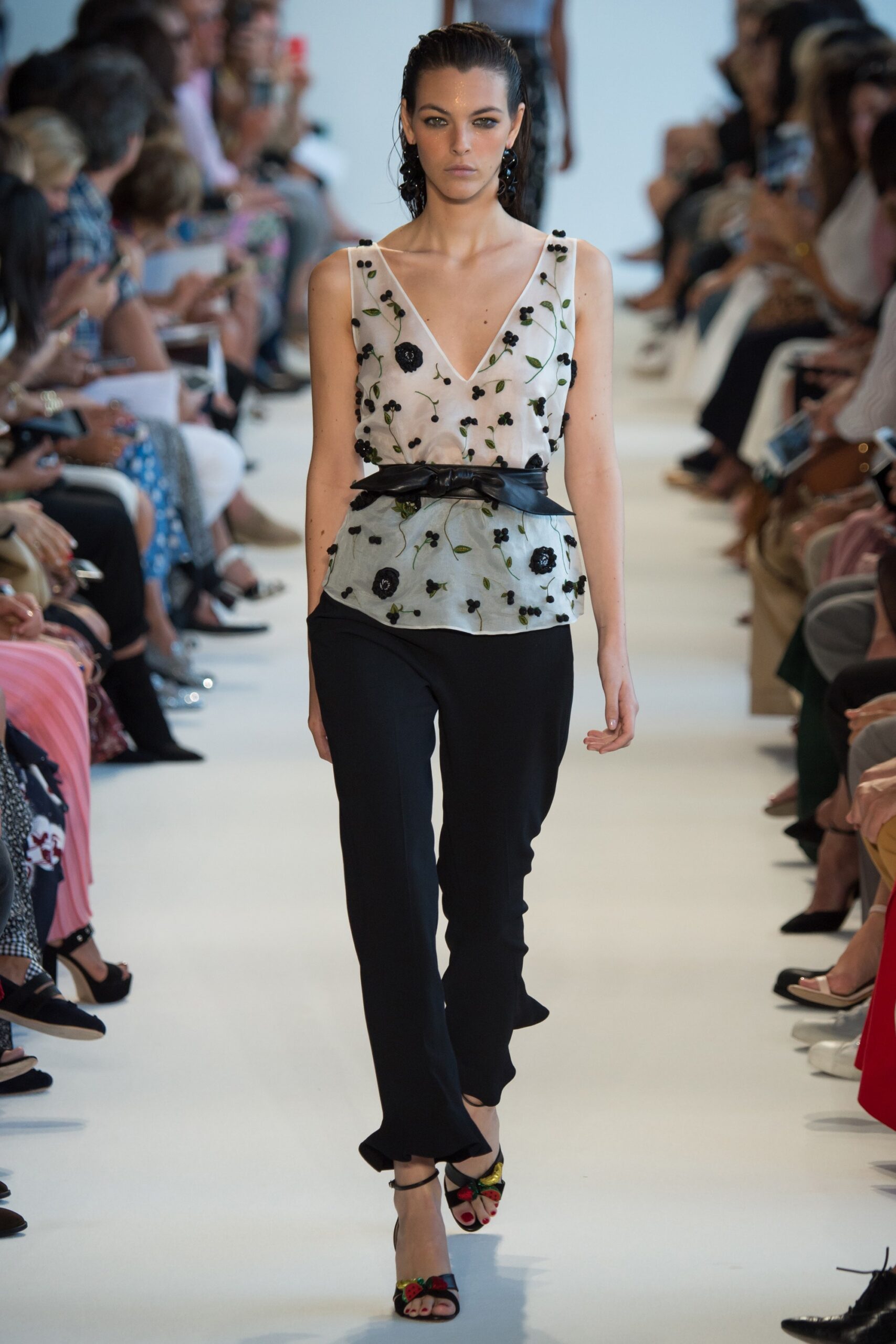 fitted black pants with embroidered top