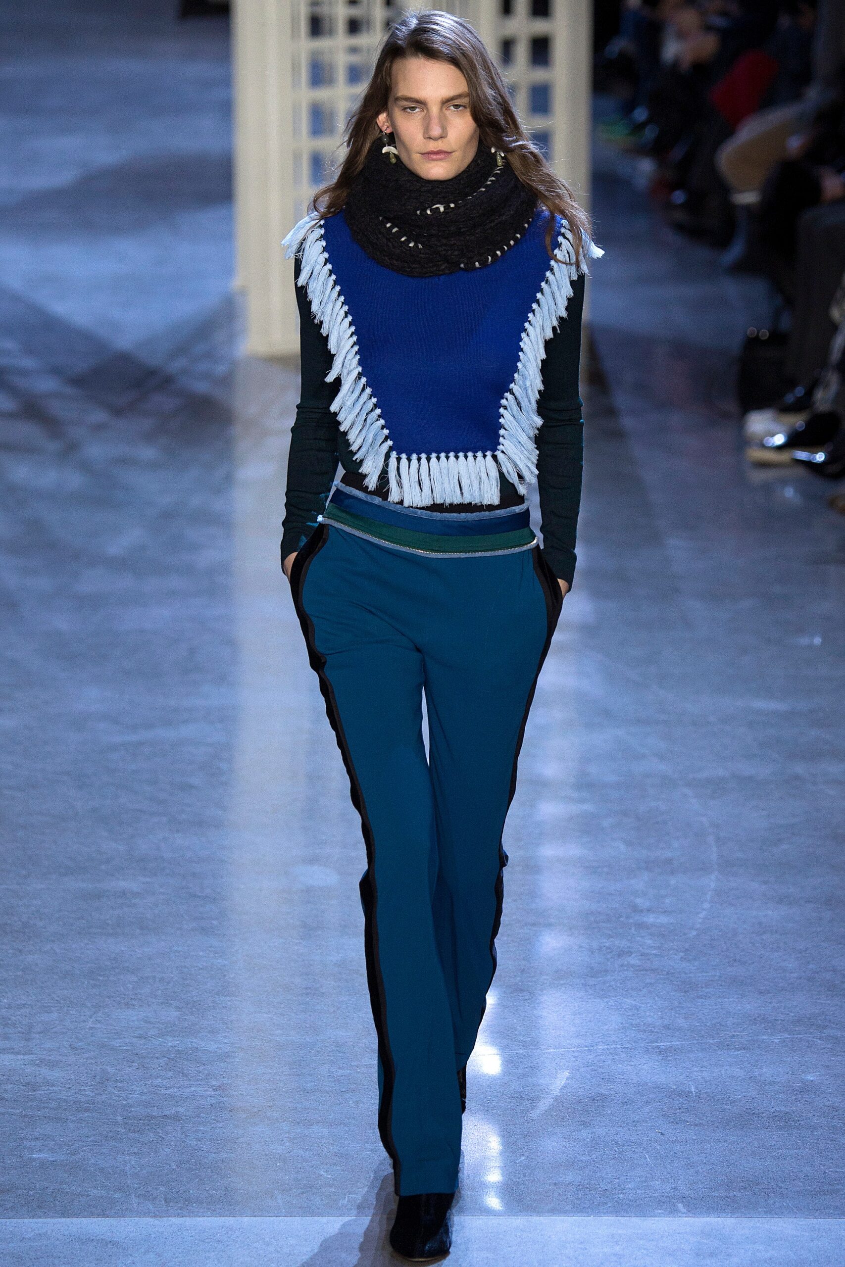 blue fringed top with teal pants