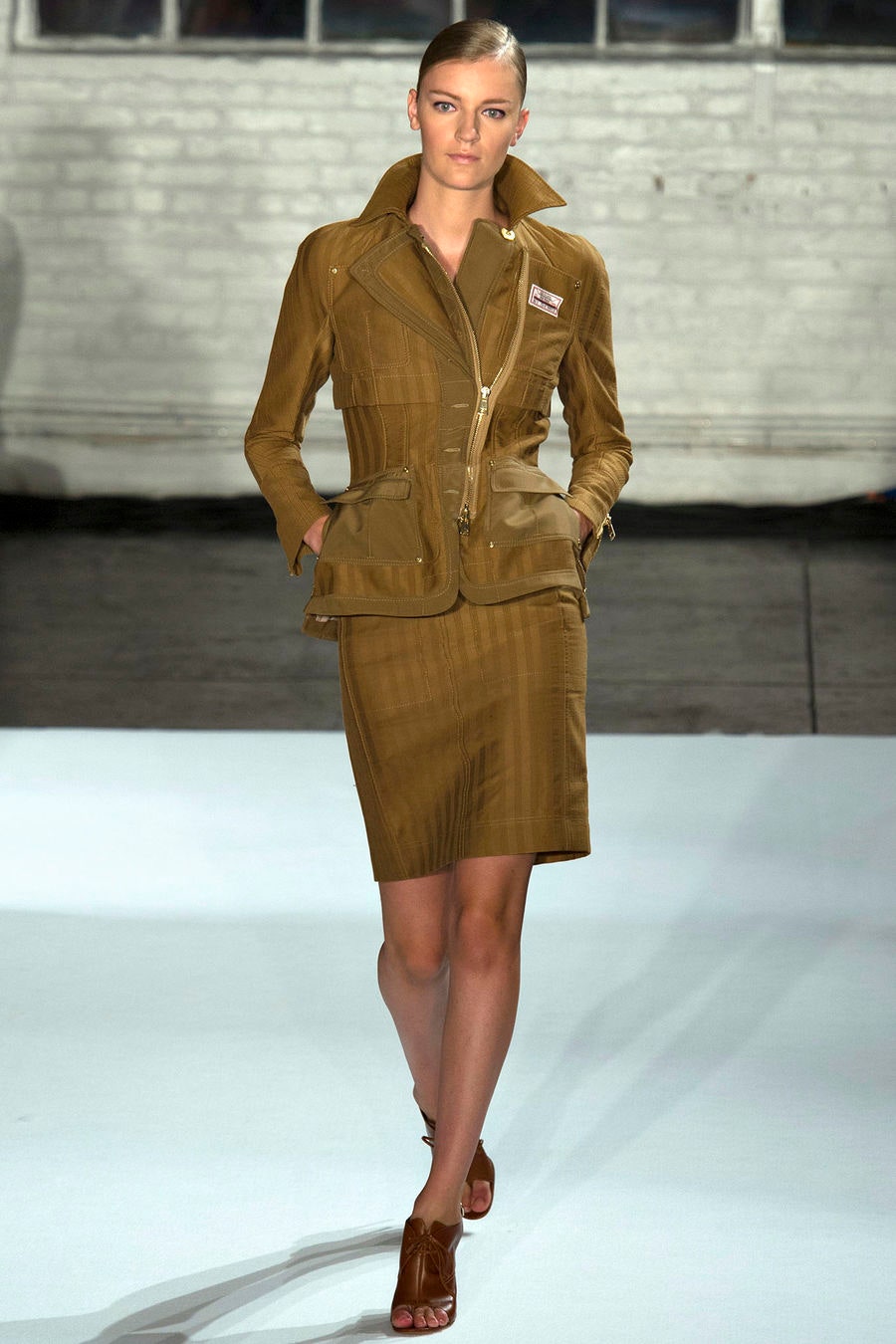 brown fitted jacket and skirt