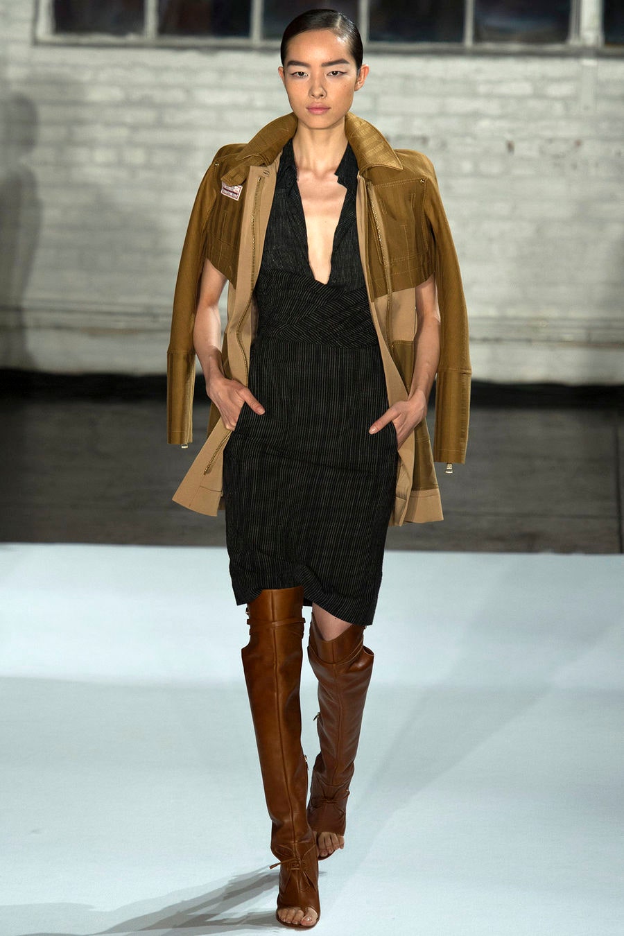 black fitted dress with brown coat