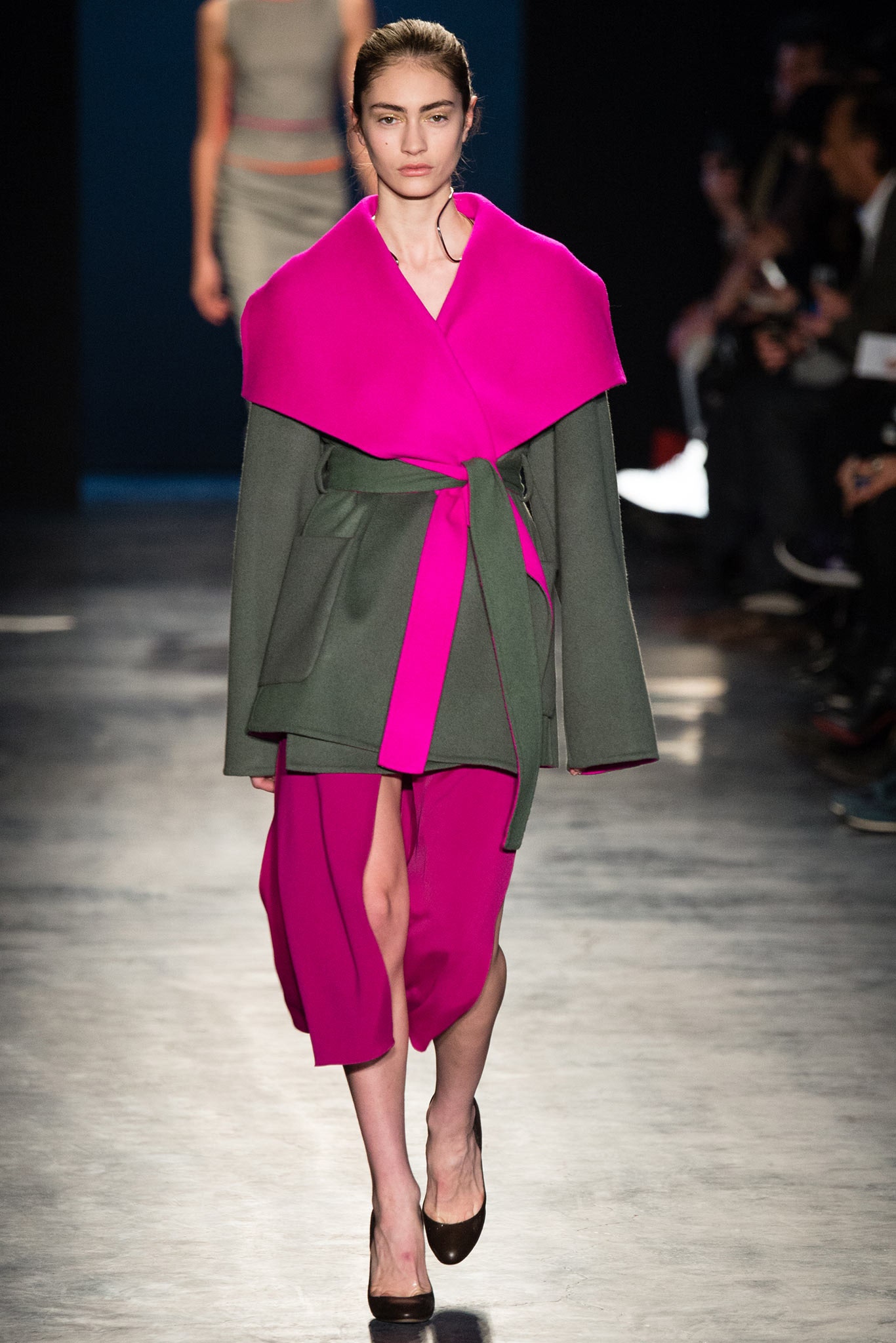 green pink belted coat and pink dress