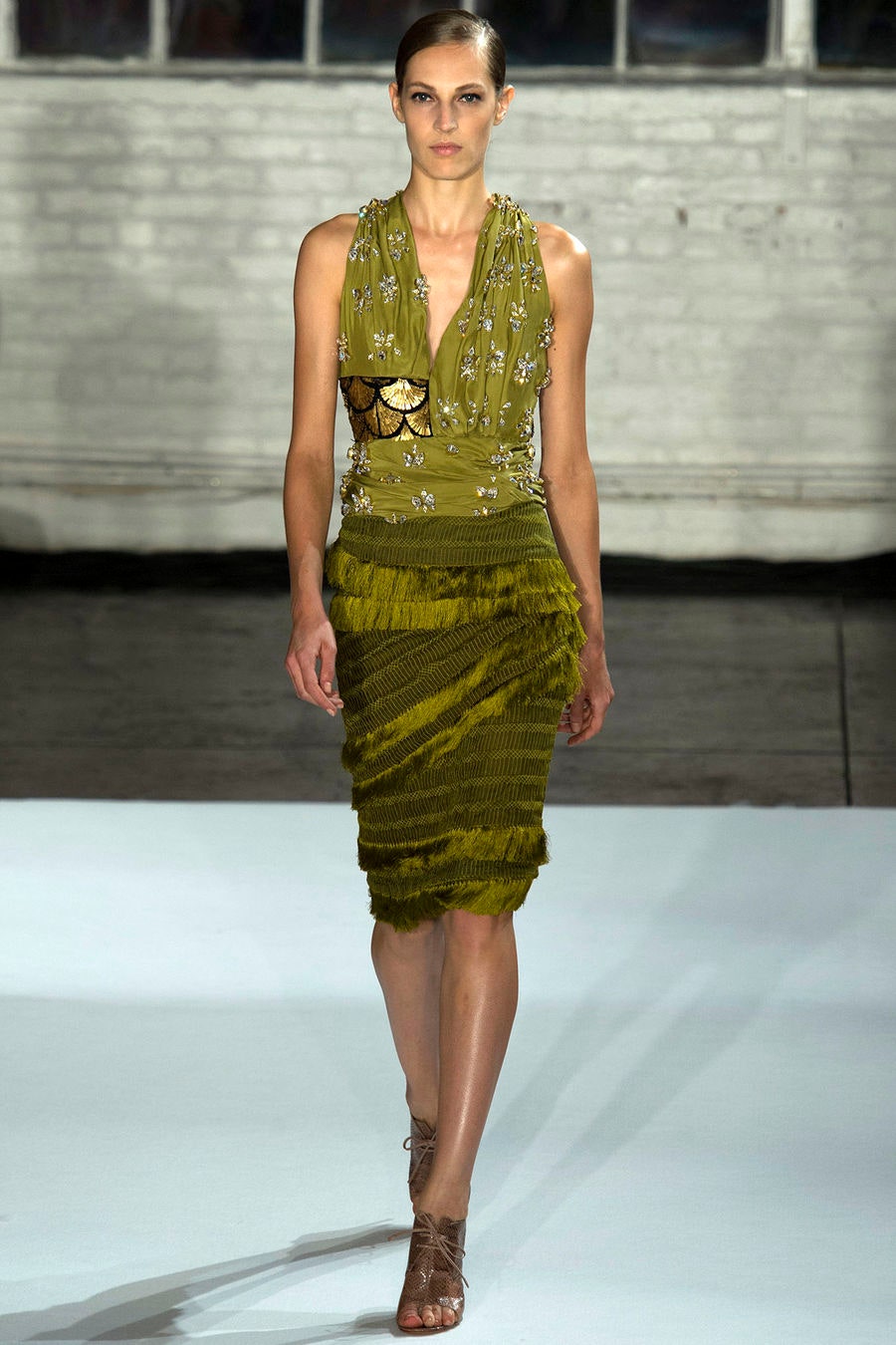 green silk fitted top and skirt