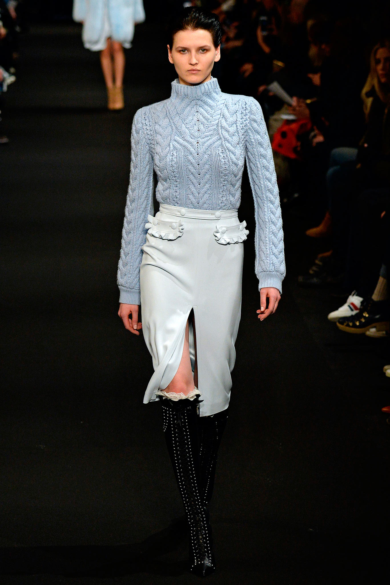 blue wool fitted sweater and white skirt
