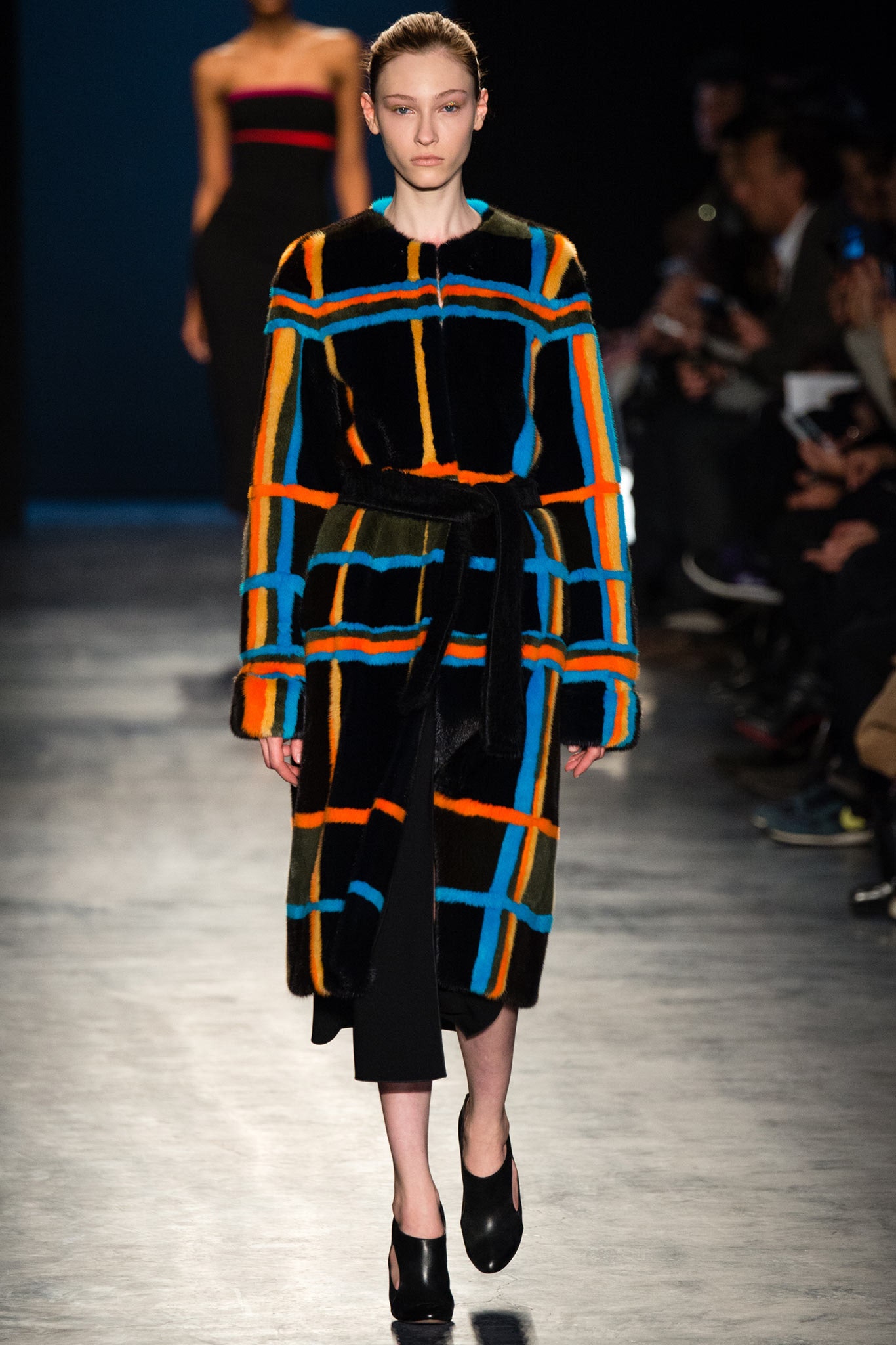 color-blocked fur coat and black dress
