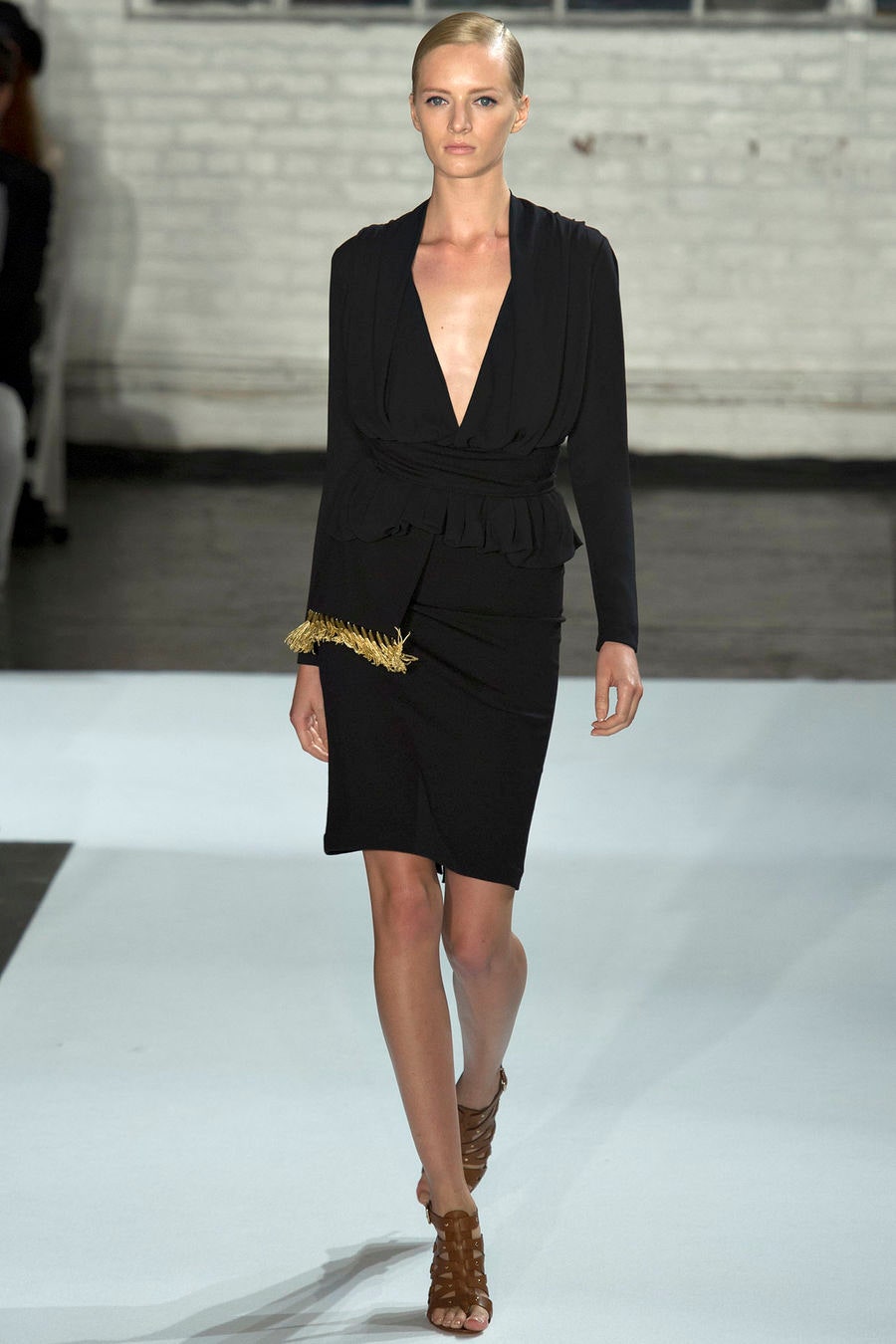 black silk fitted dress with strappy shoes