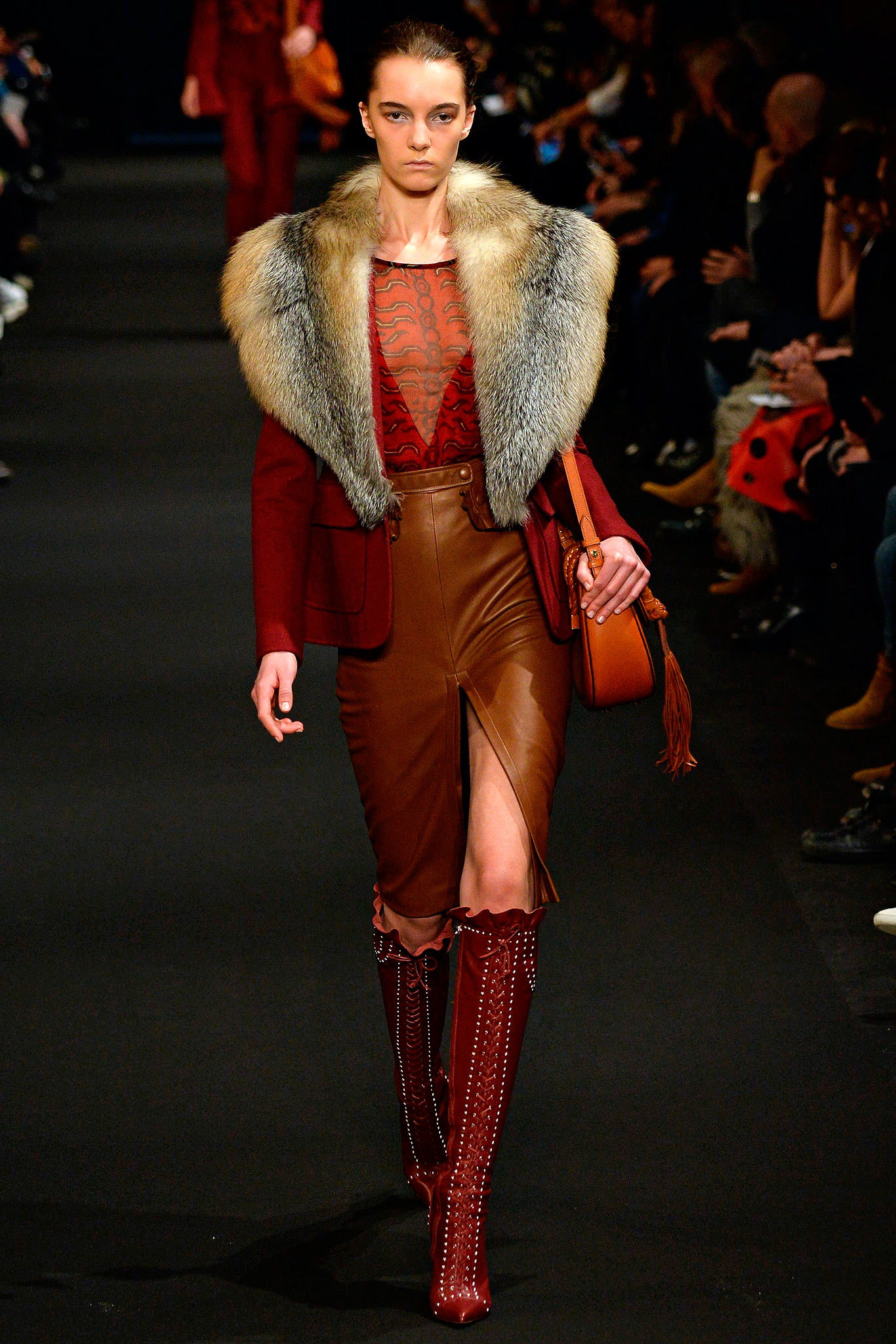 red tailored blazer with leather skirt