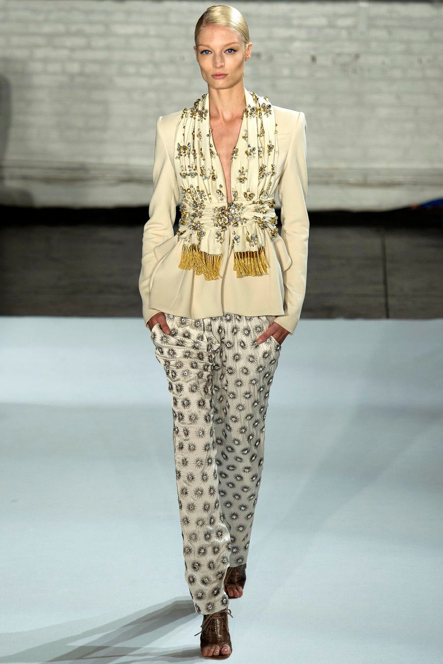 beige tailored blazer with printed pants