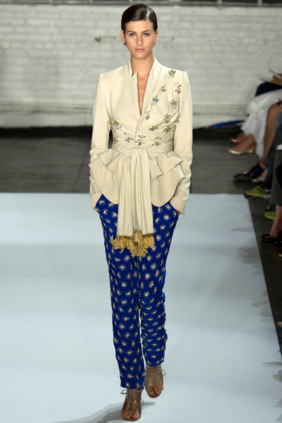 beige silk blouse with blue printed pants