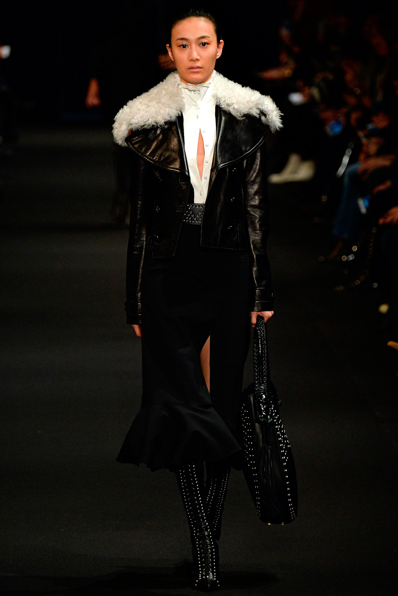 black leather jacket with white blouse