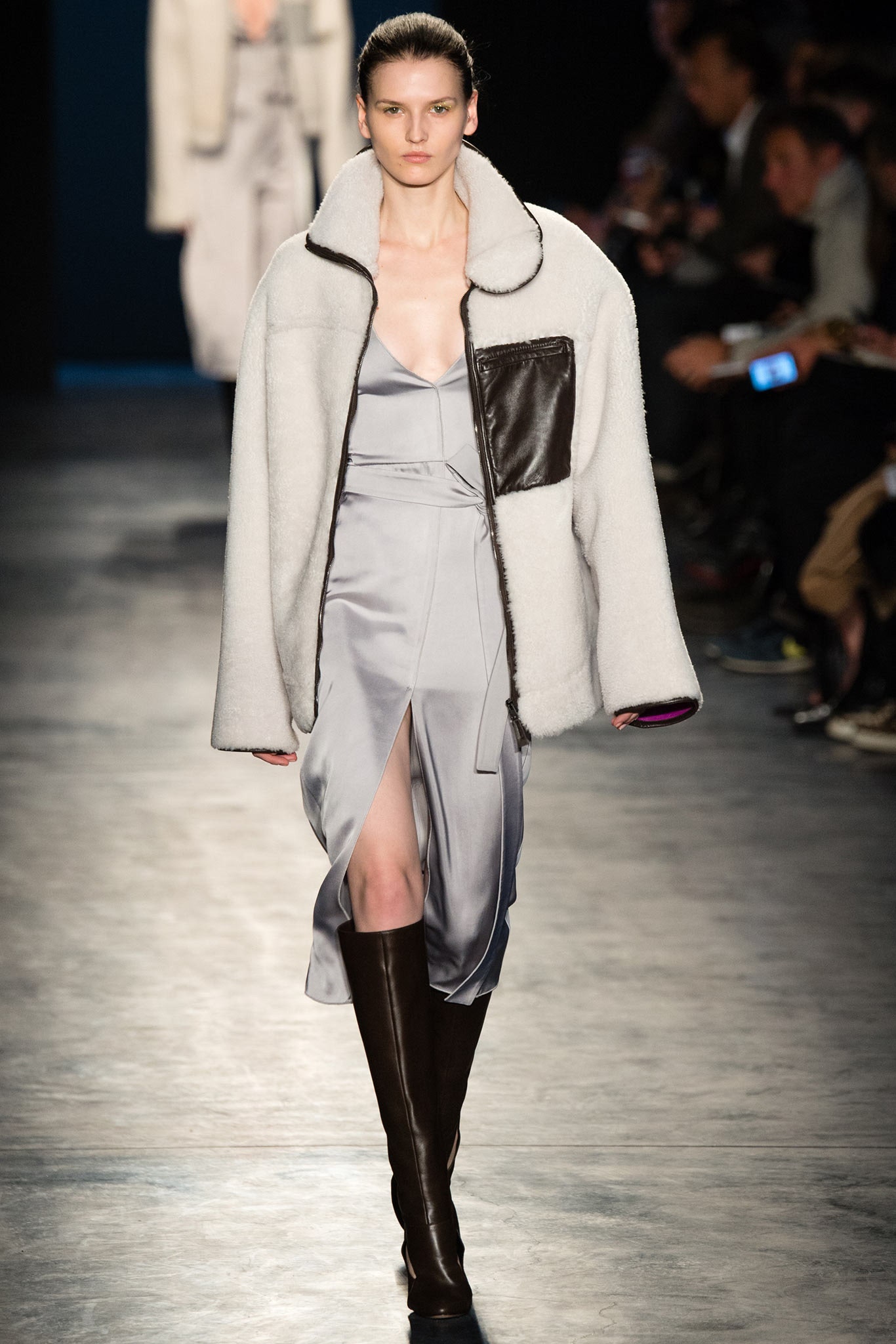 relaxed white wool coat and gray silk dress