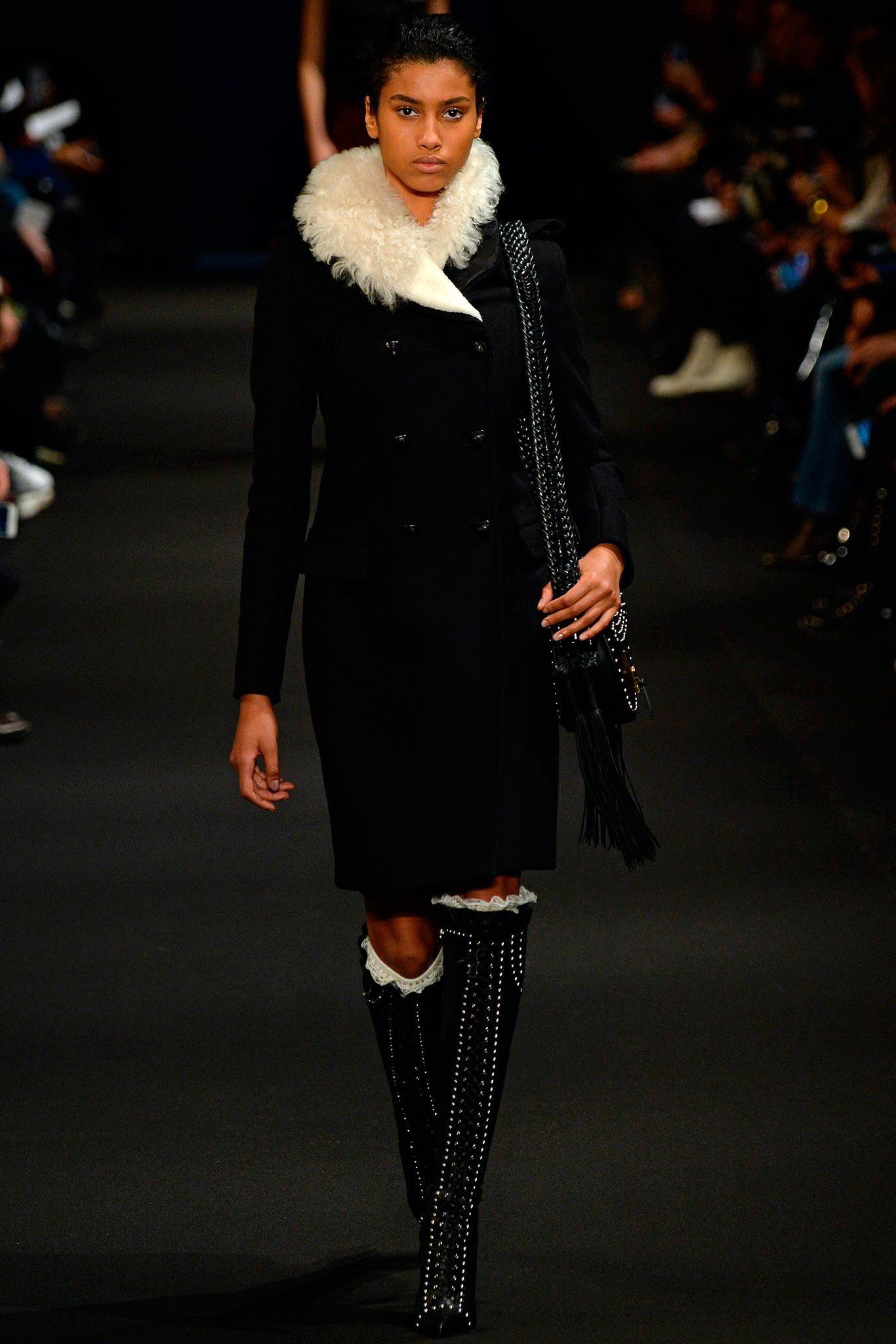 black wool coat with embellished boots