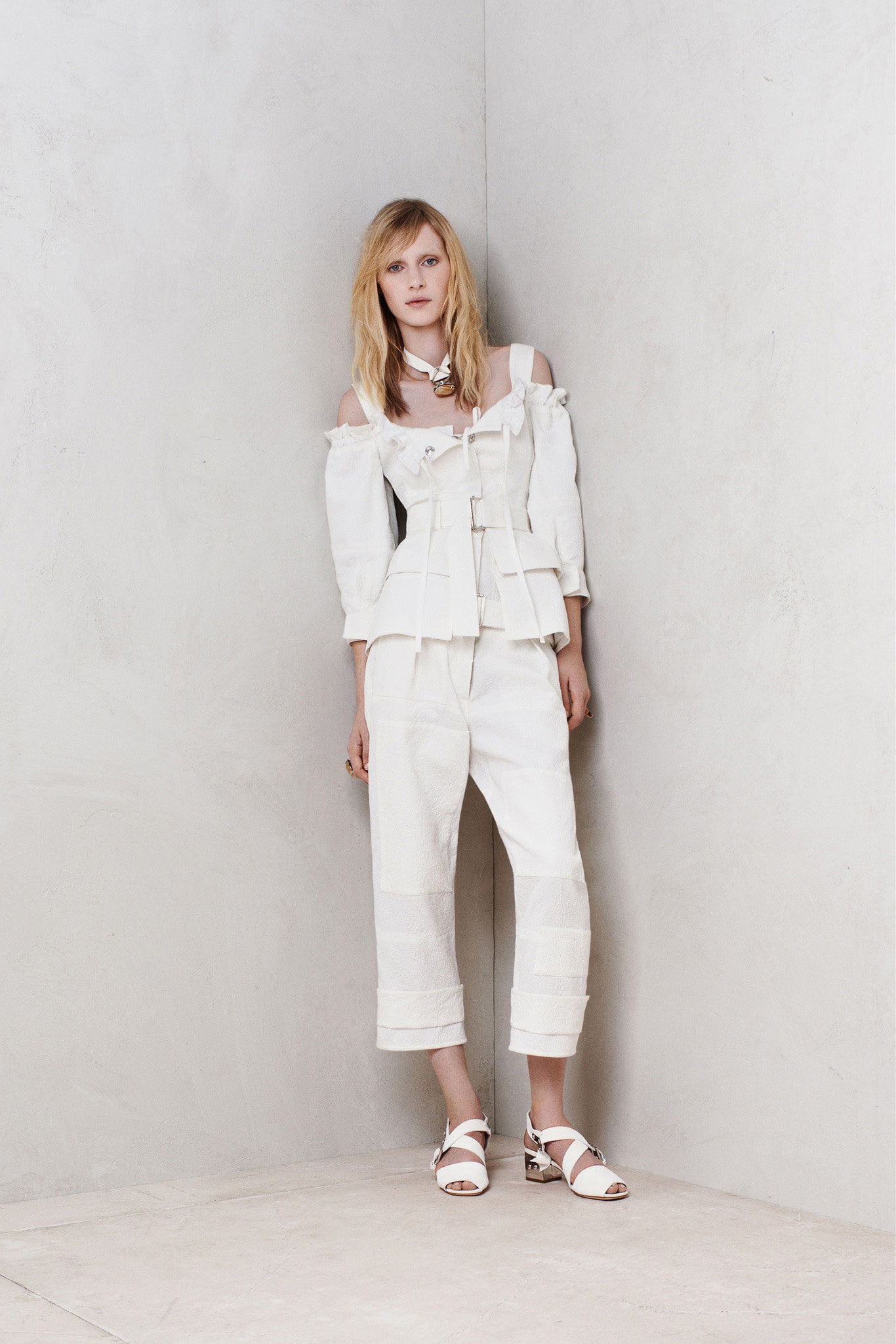 white off-shoulder top with cropped pants