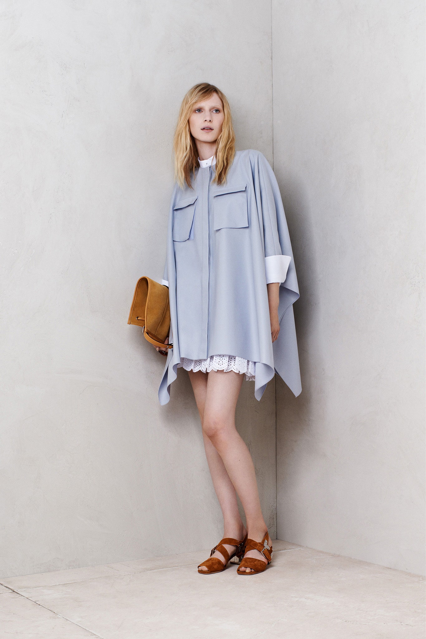 blue cape with white lace dress