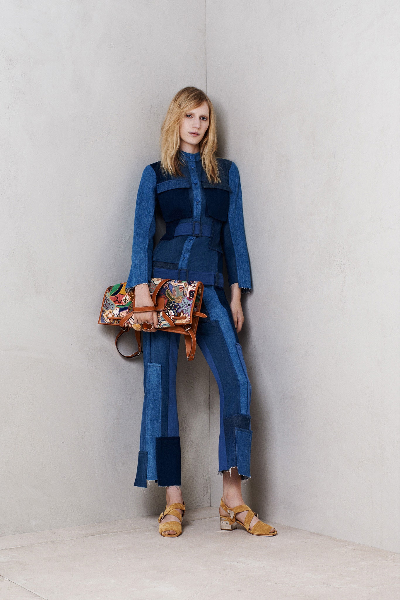 blue denim jumpsuit with accessories