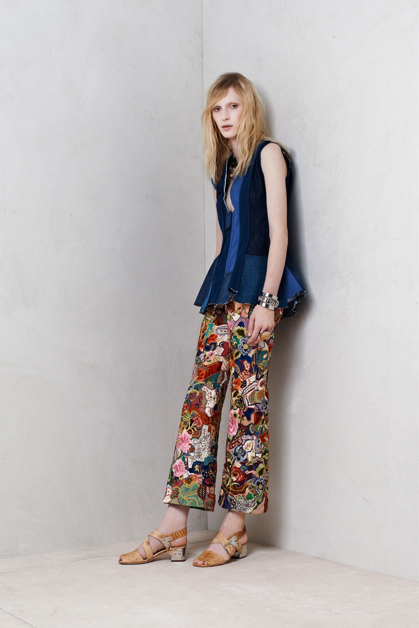 blue denim sleeveless top with multi-colored pants
