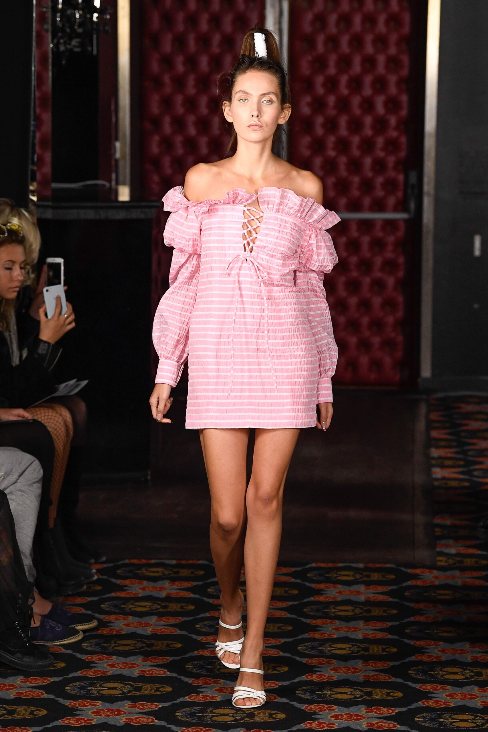 pink ruffled off-shoulder mini dress